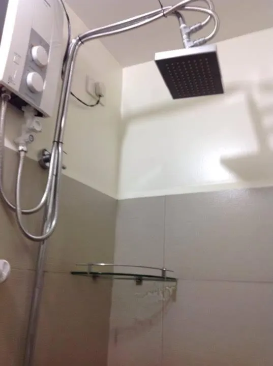 Shower in AED Manila Bay view at Green Residences