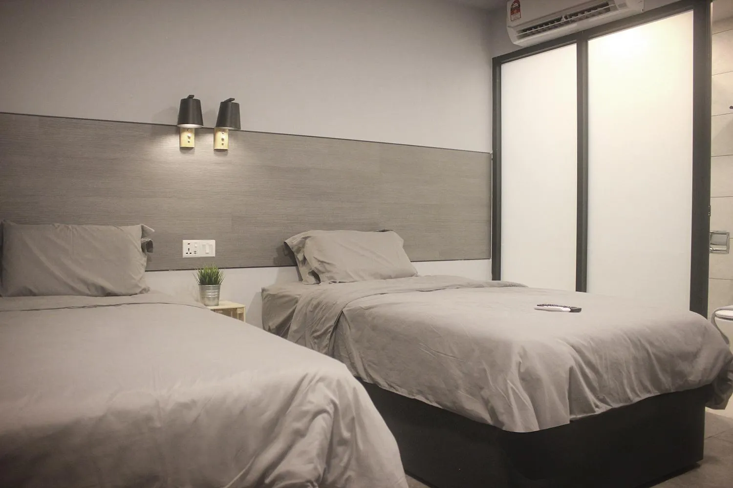 Bed in Vertilex Hotel