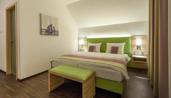 Photo of the whole room, Bed in Schlosshotel Ingelfingen