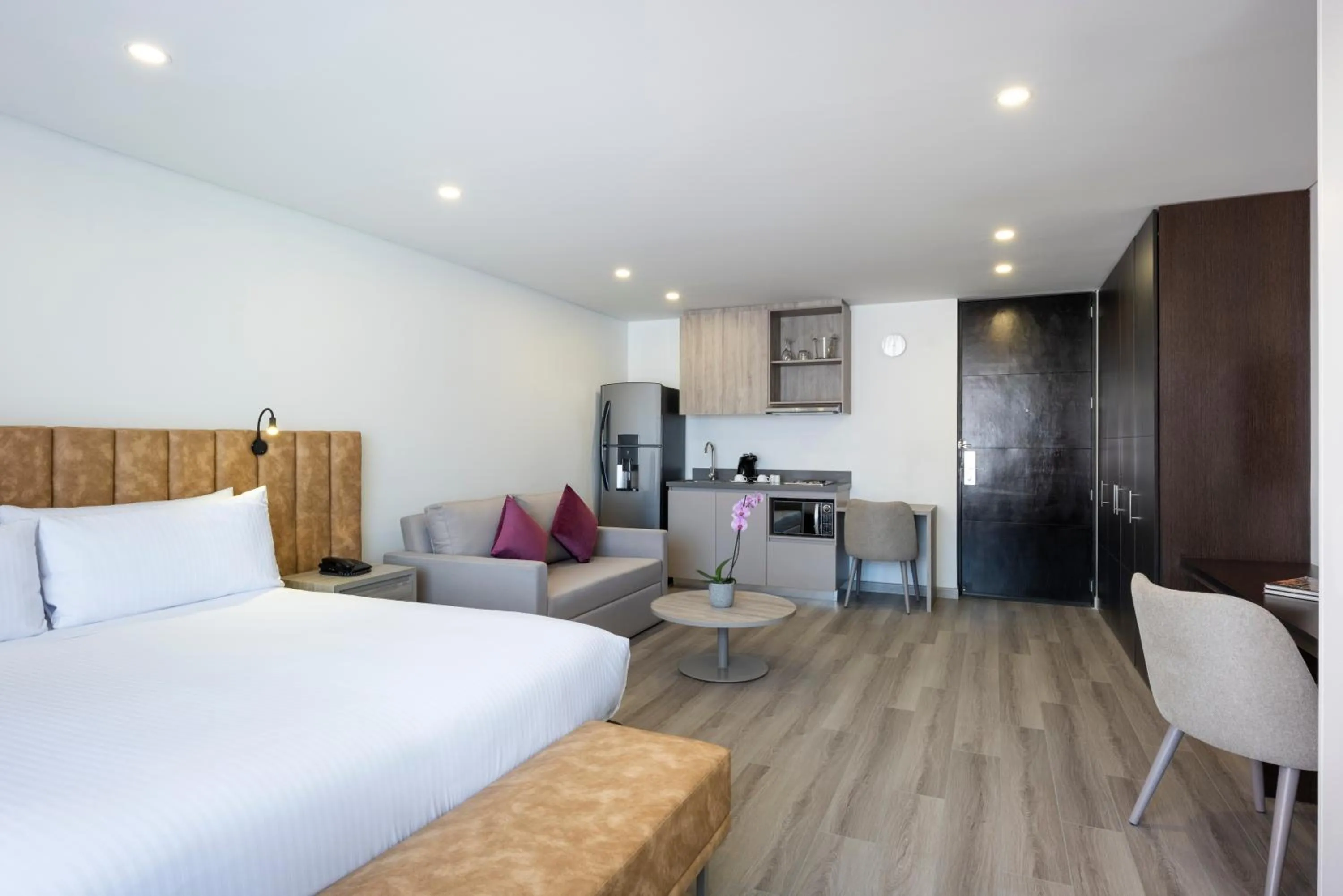 Bed in Hotel Jazz Apartments