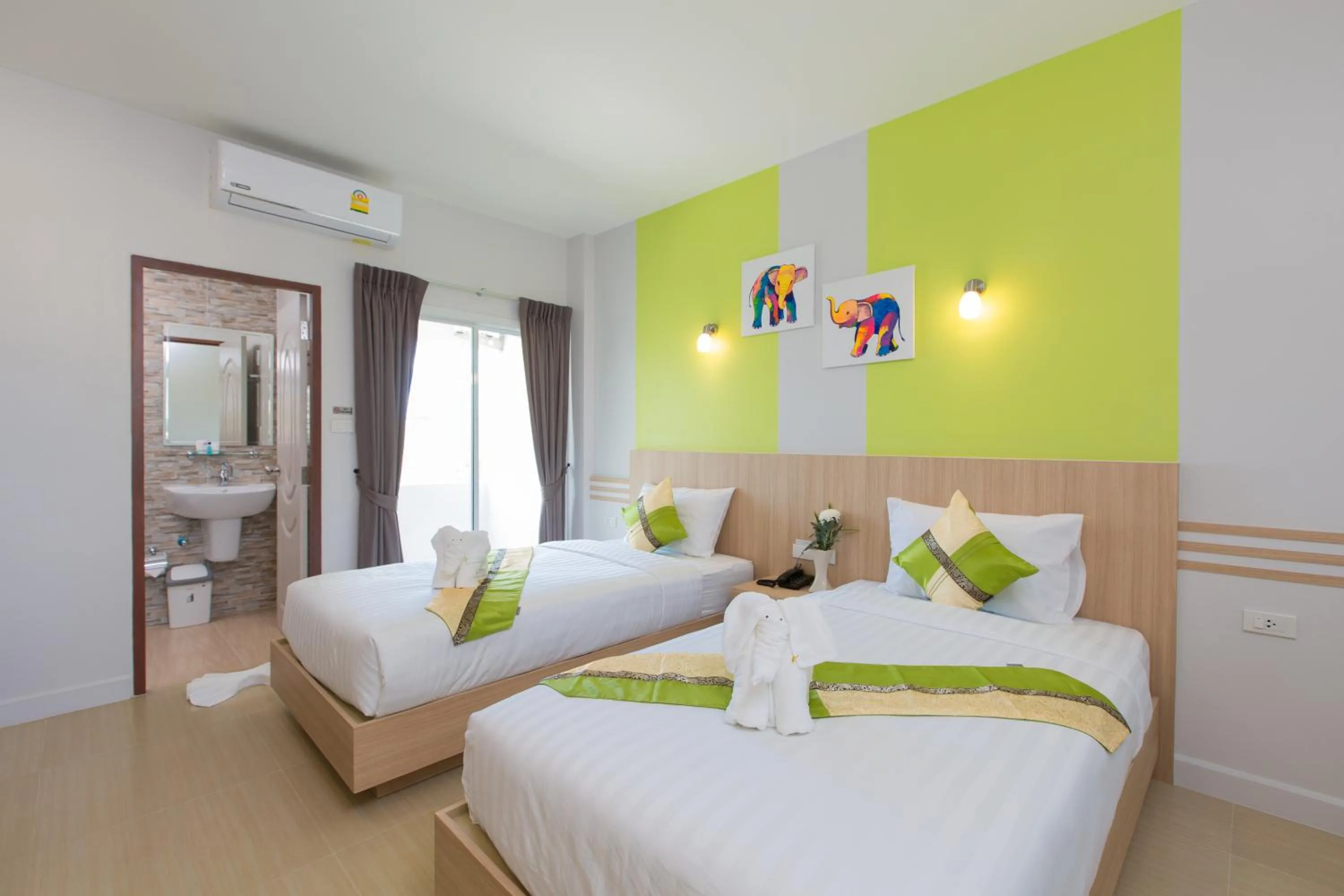 Bed in Phant at Thalang Service Apartment