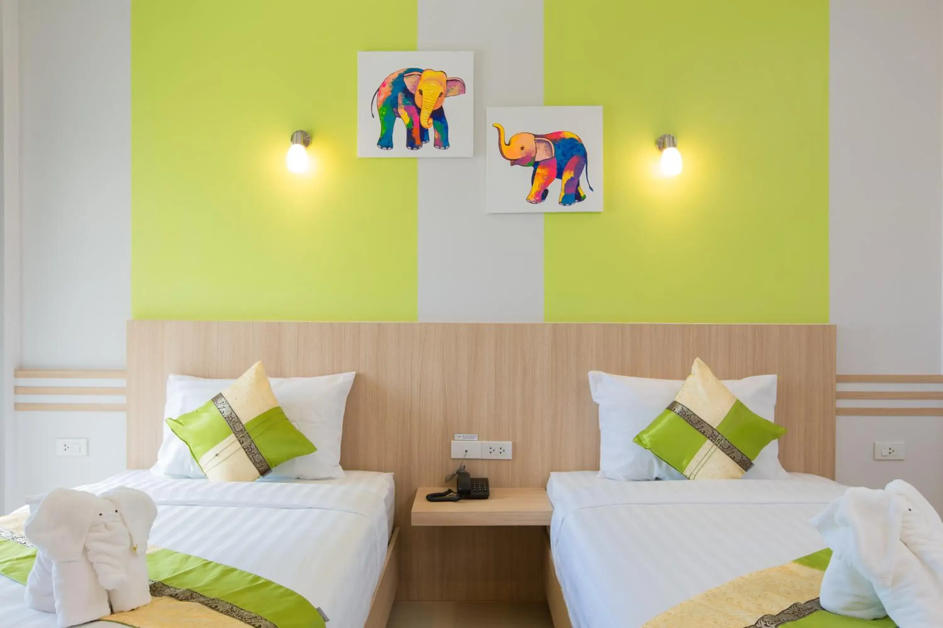 Bed in Phant at Thalang Service Apartment Bed in Phant at Thalang Service Apartment