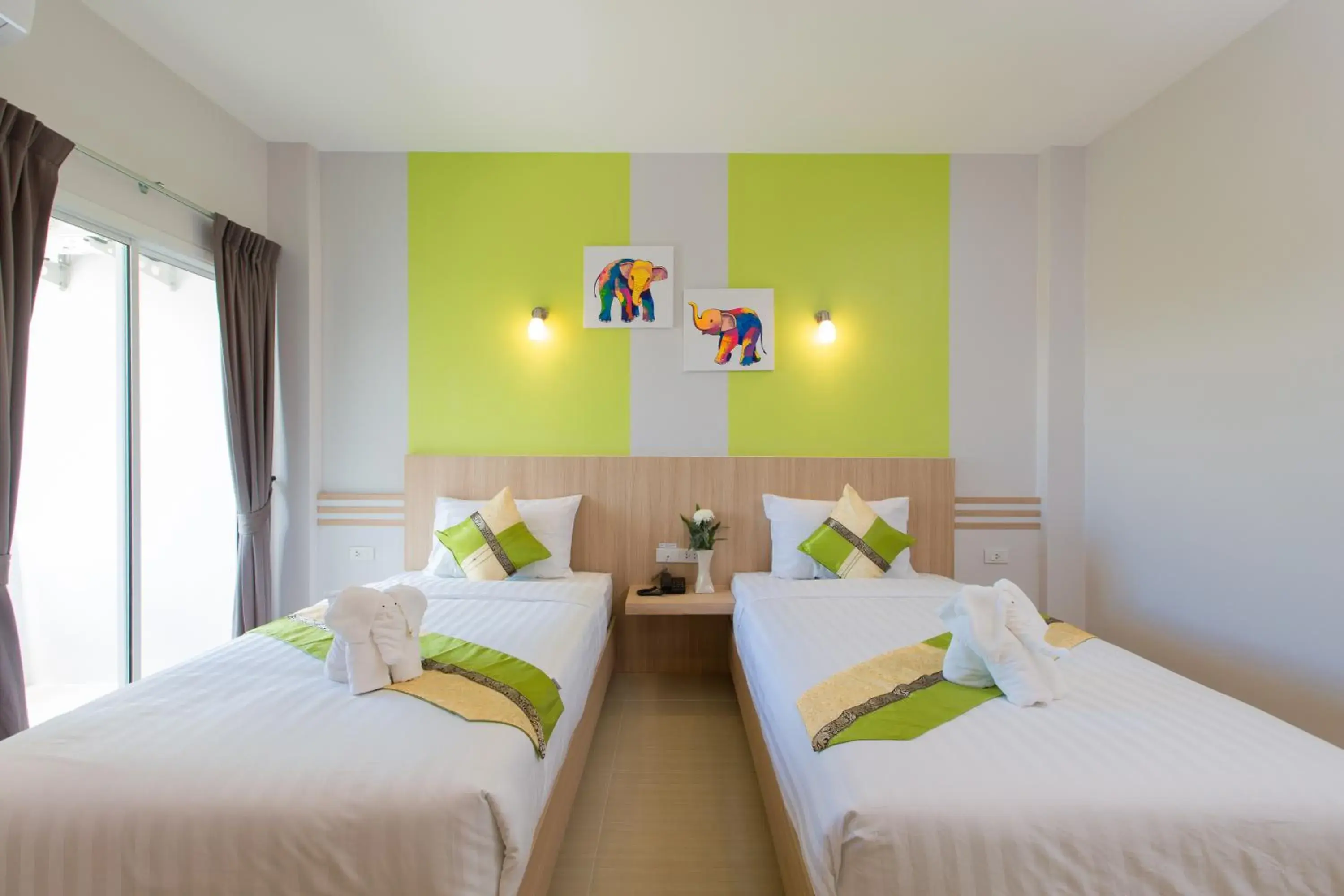 Bed in Phant at Thalang Service Apartment Bed in Phant at Thalang Service Apartment