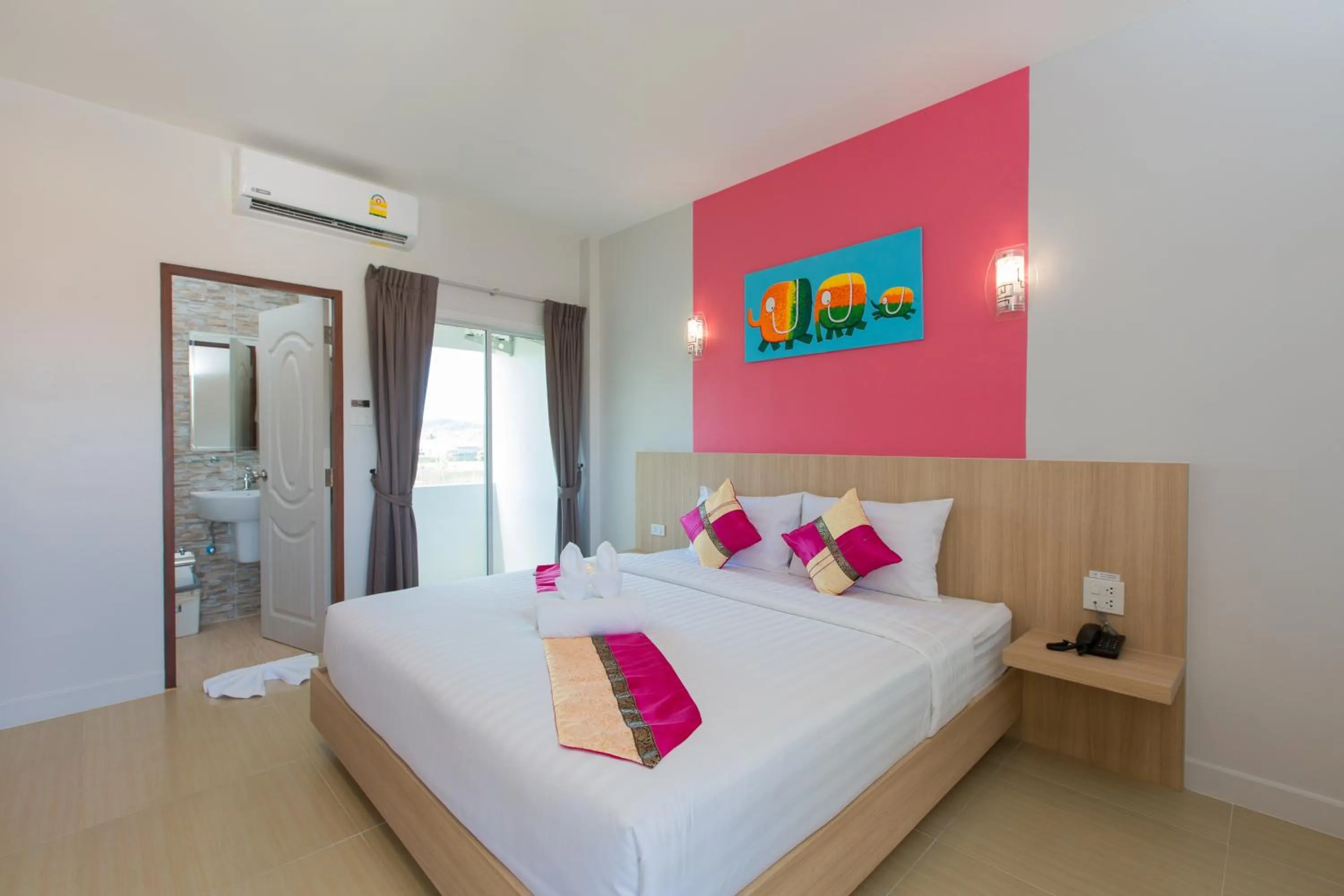 Bed in Phant at Thalang Service Apartment