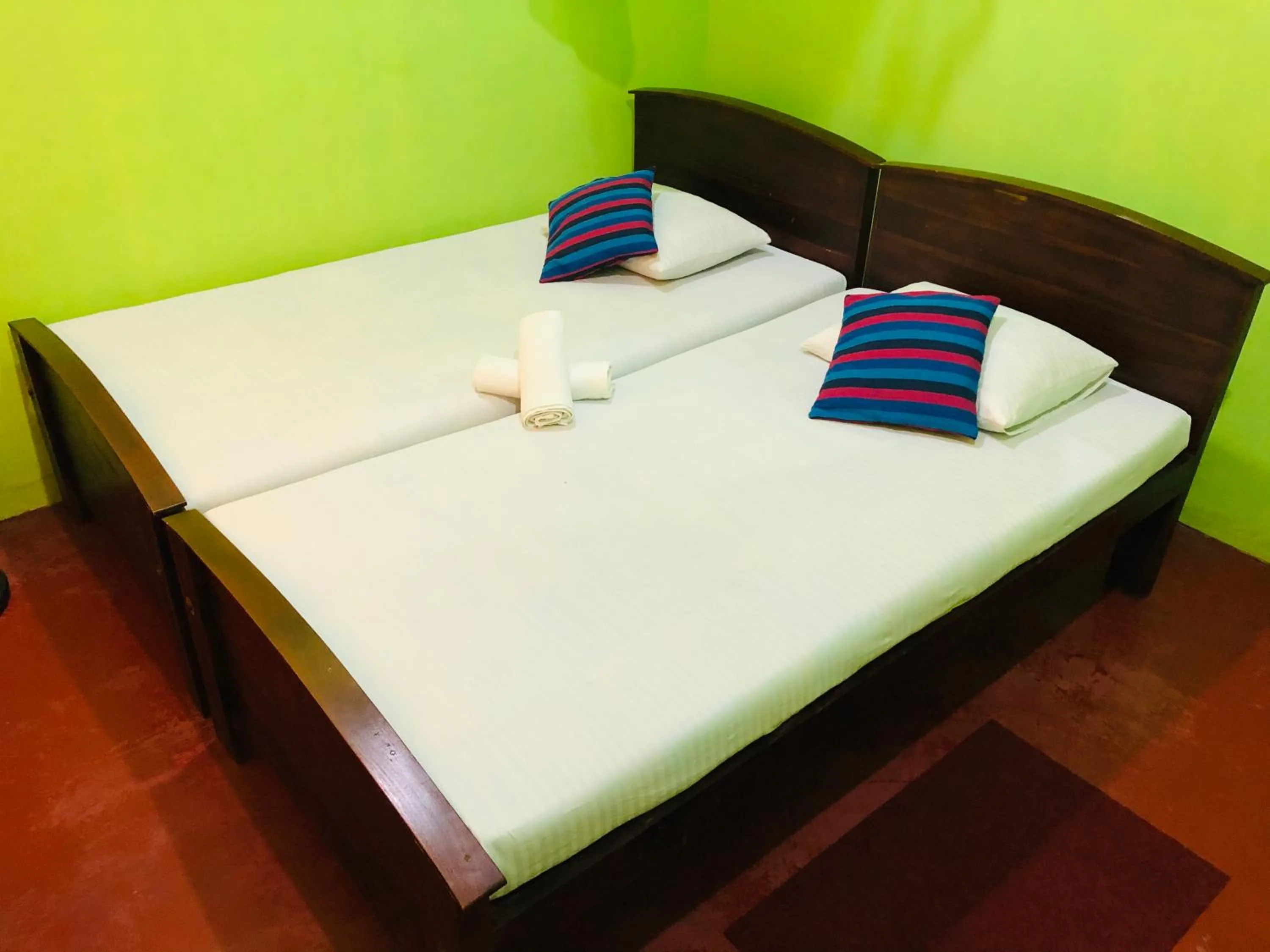 Bed in Kumari Guest House