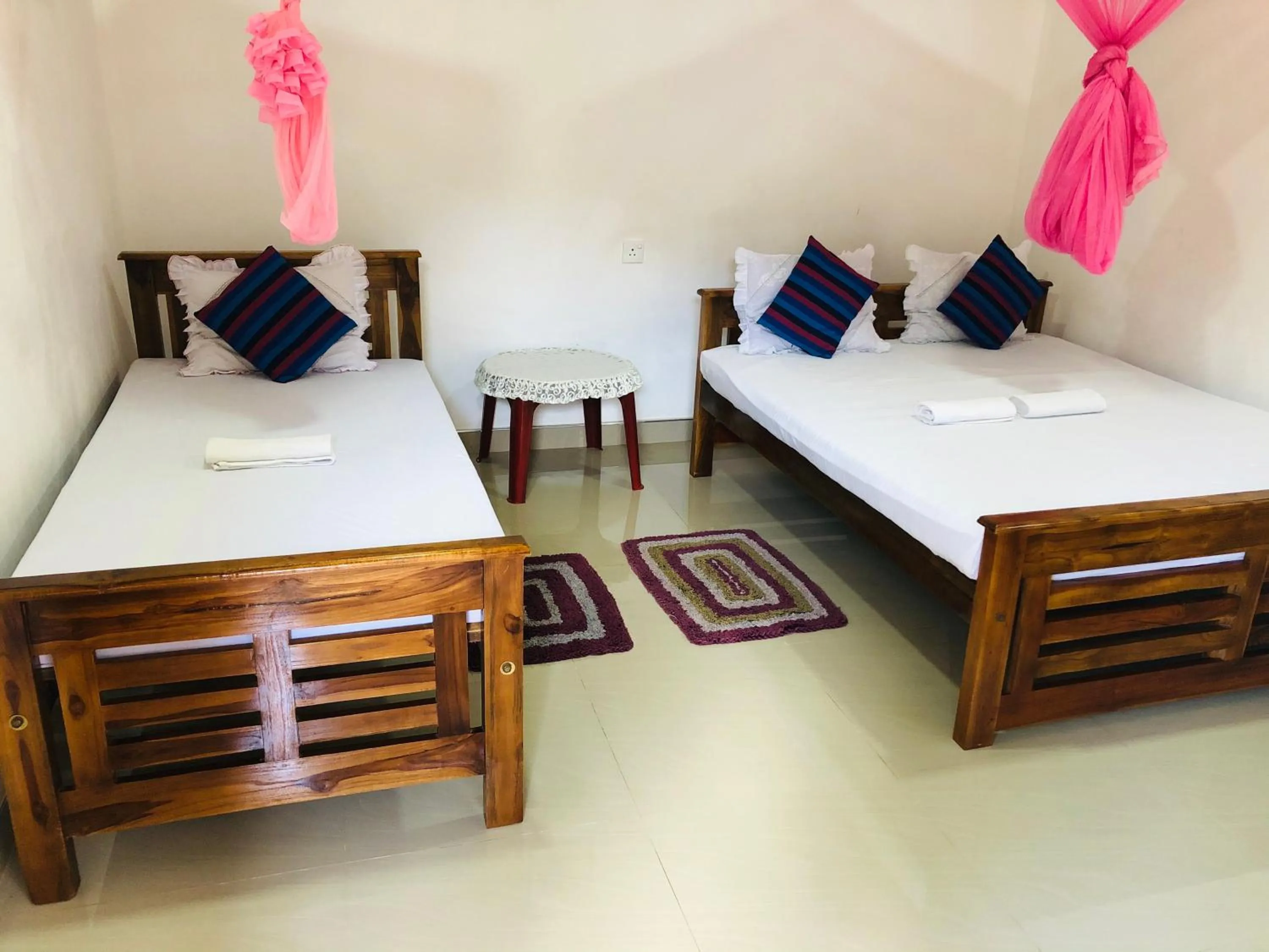 Bed in Kumari Guest House