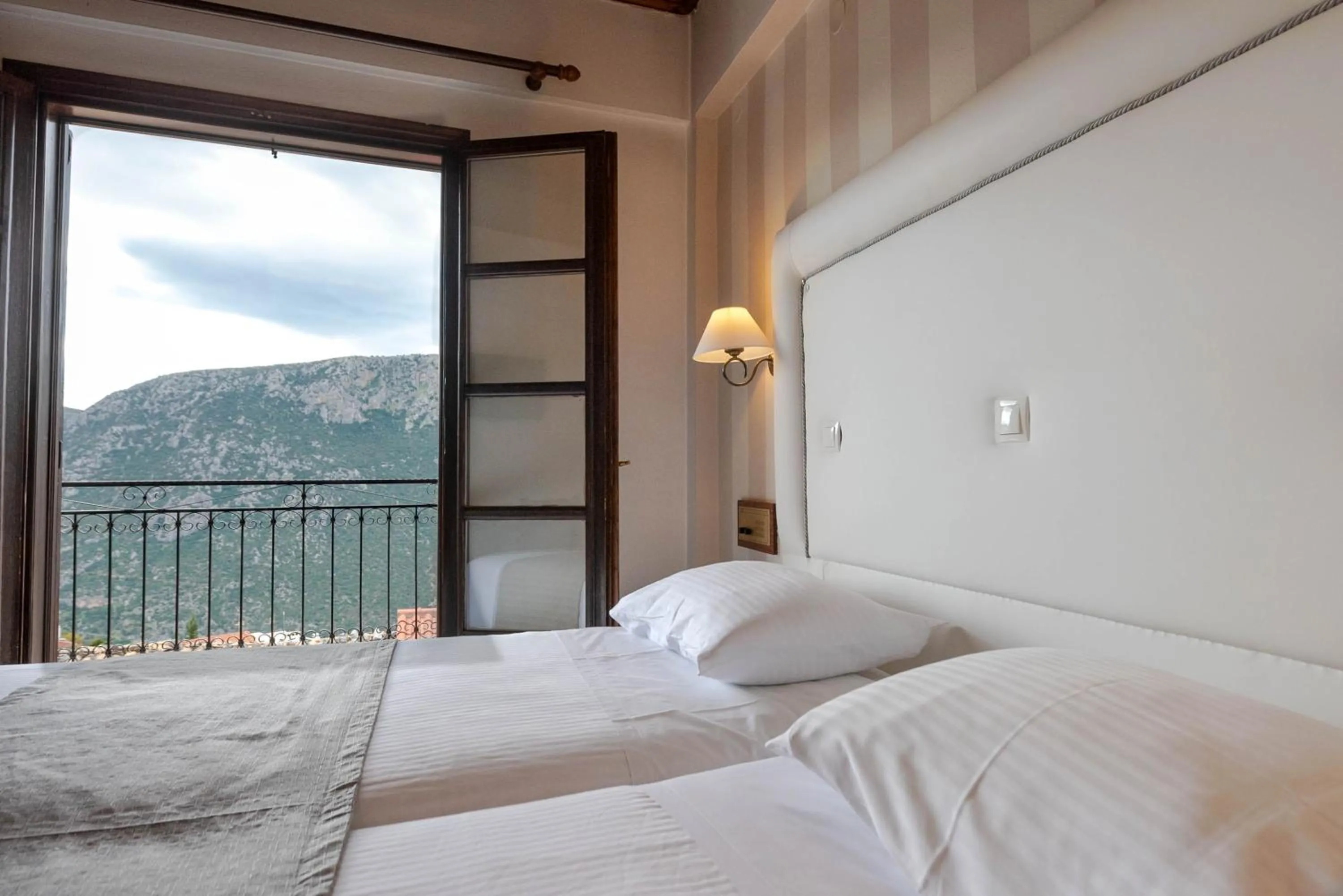 View (from property/room), Bed in Kouros Hotel