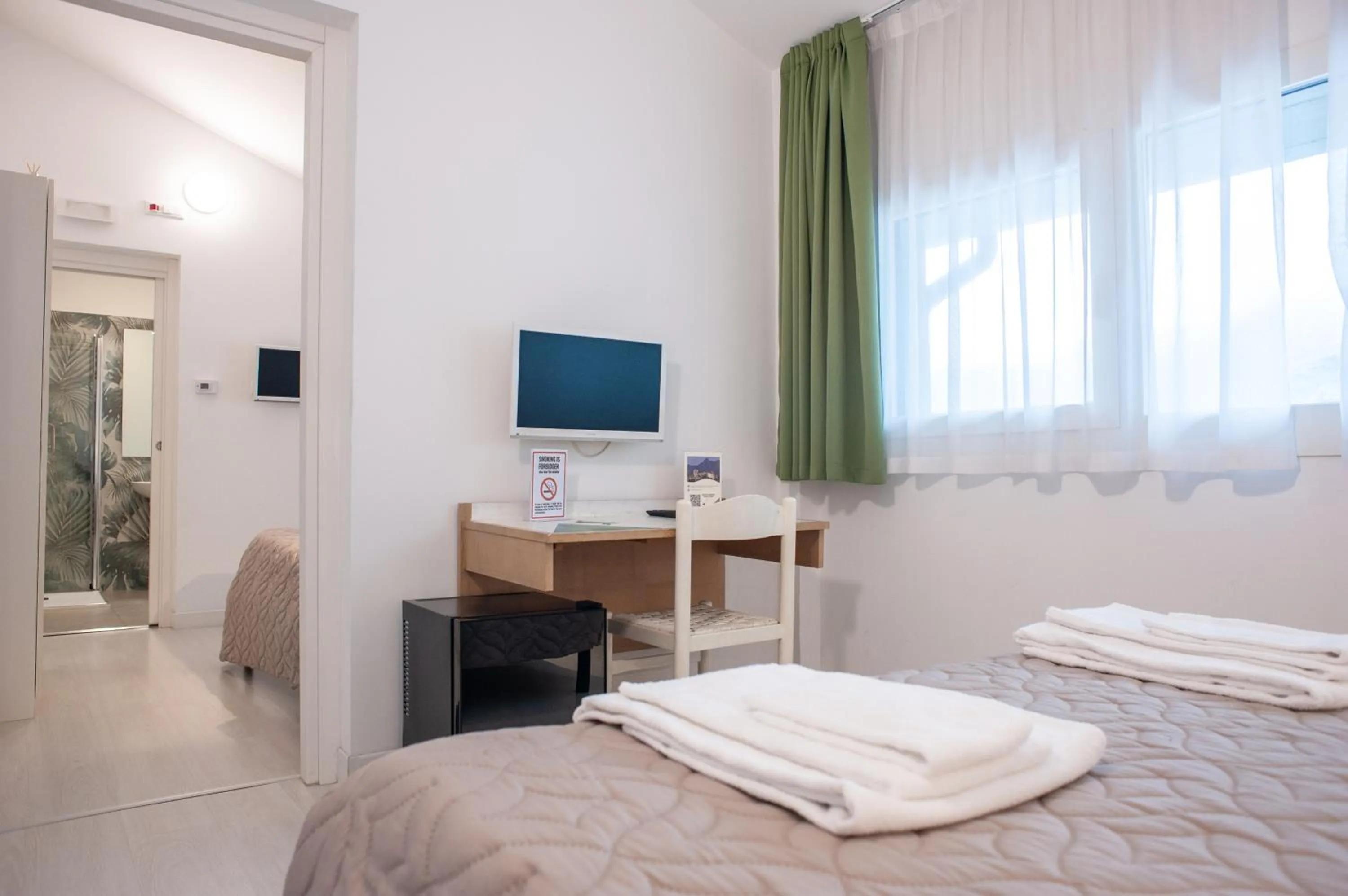 Bedroom, Bed in Hotel Giardino