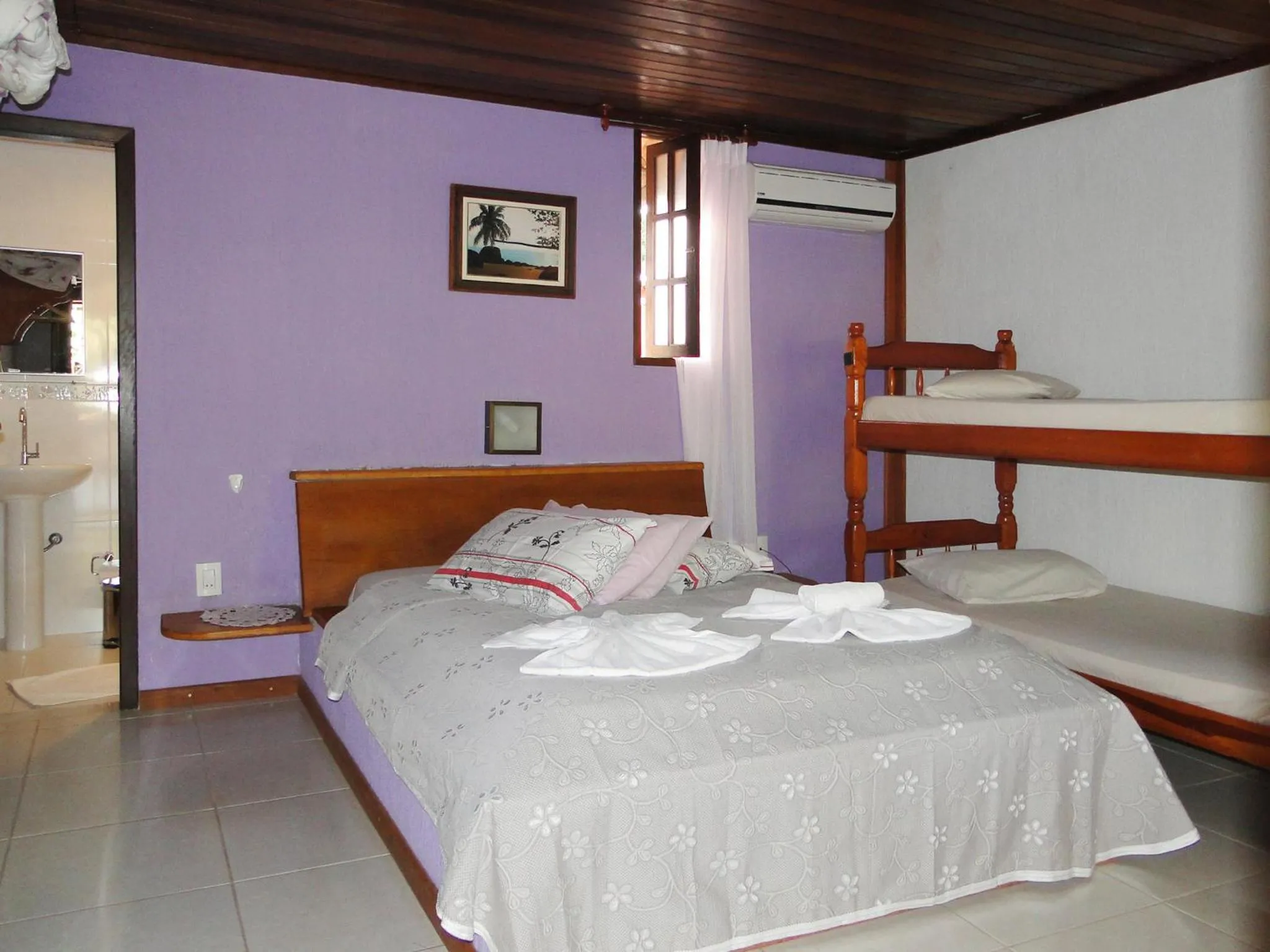 Photo of the whole room, Bed in Pousada Caúca