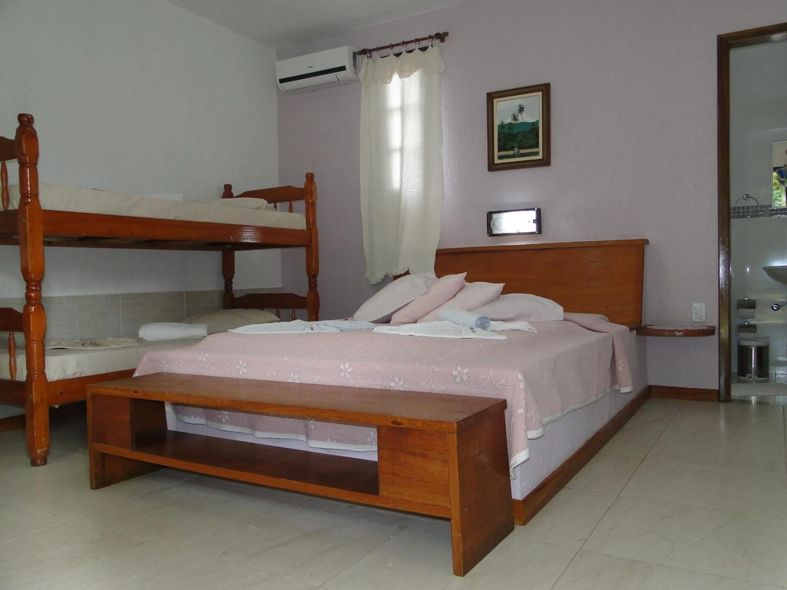 Photo of the whole room, Bed in Pousada Caúca
