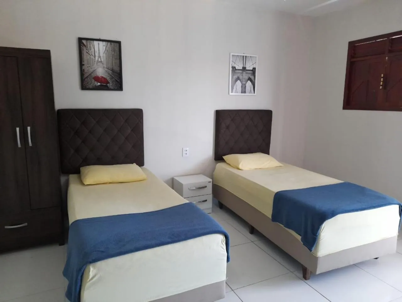 Bed in Pousada e Posto Amigão