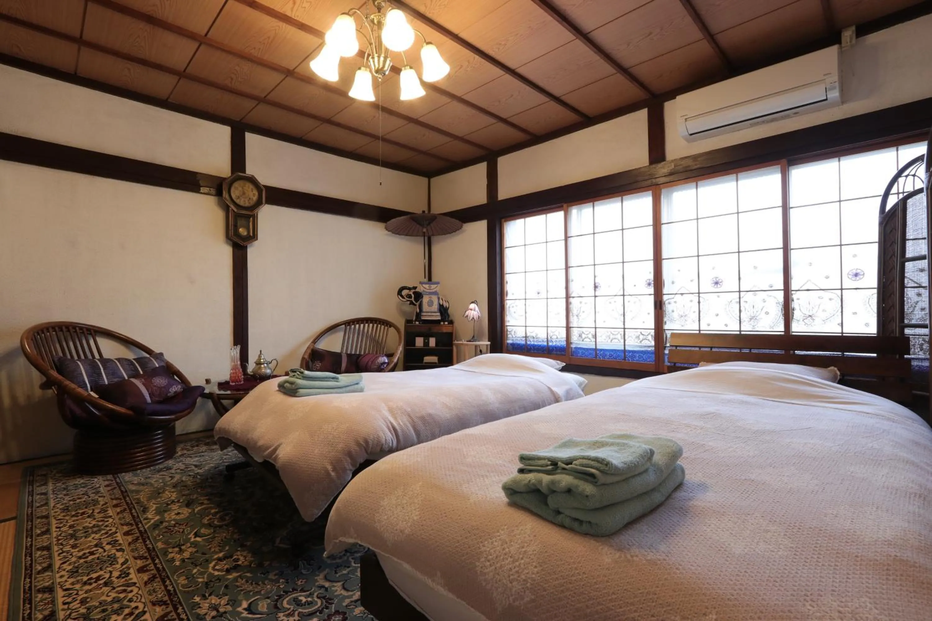 Bed in Shanti House Sakaiminato