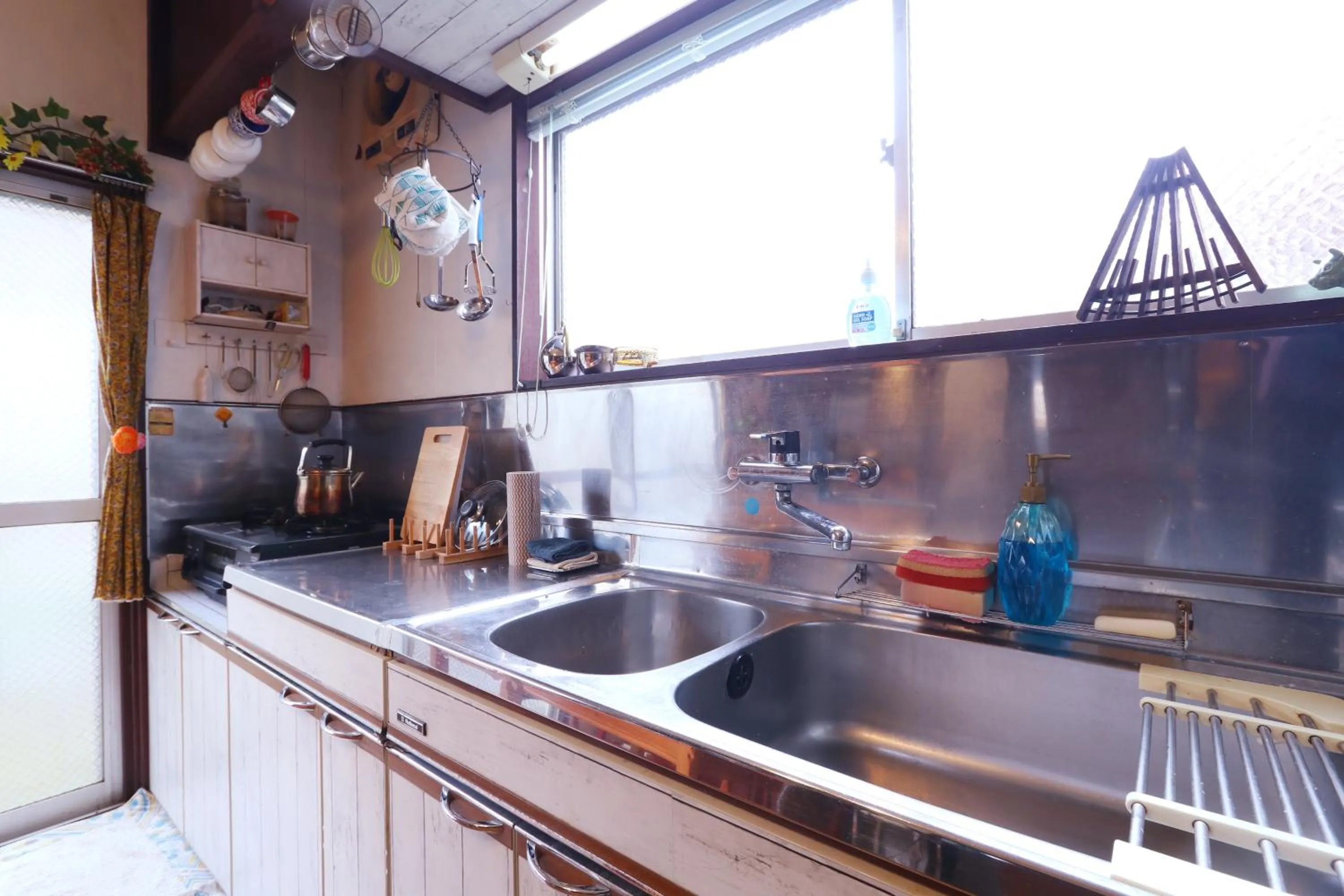 Kitchen or kitchenette in Shanti House Sakaiminato