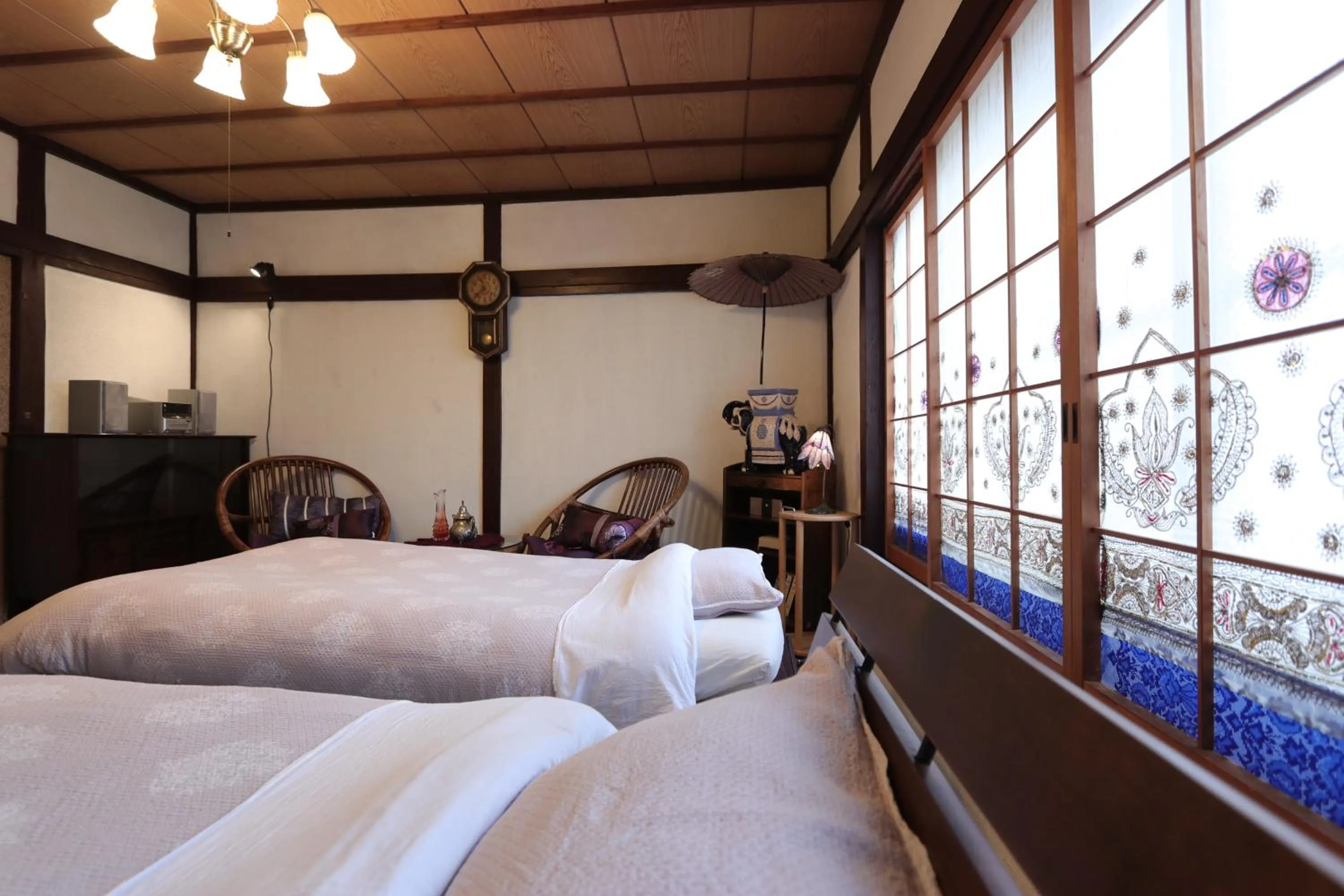 Bed in Shanti House Sakaiminato