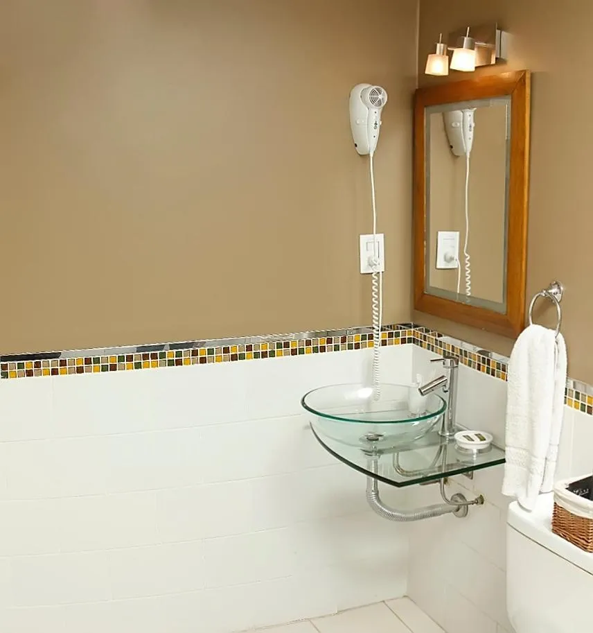 Toilet in La Rozada Suites