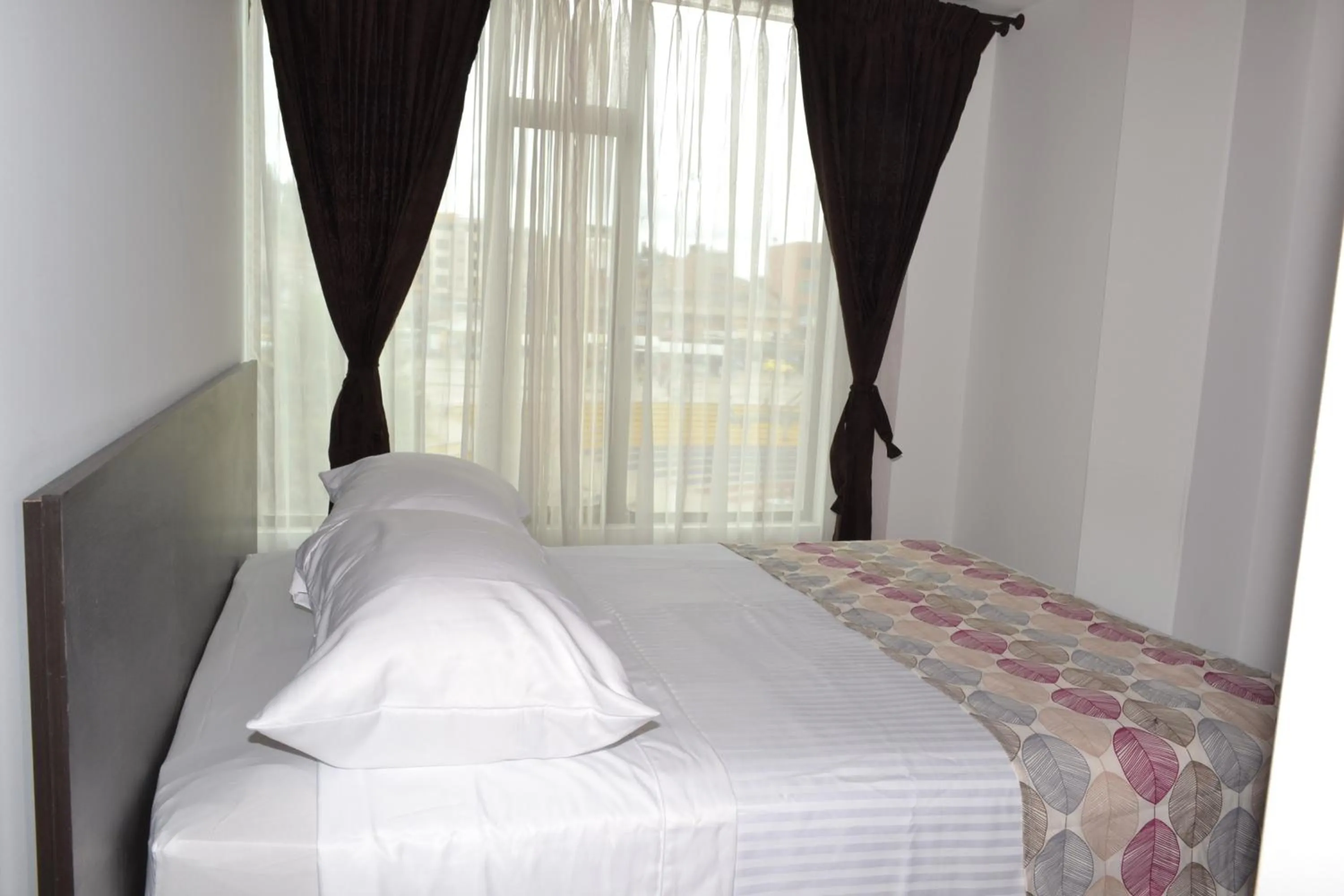 Bed in Apartahotel Doble3