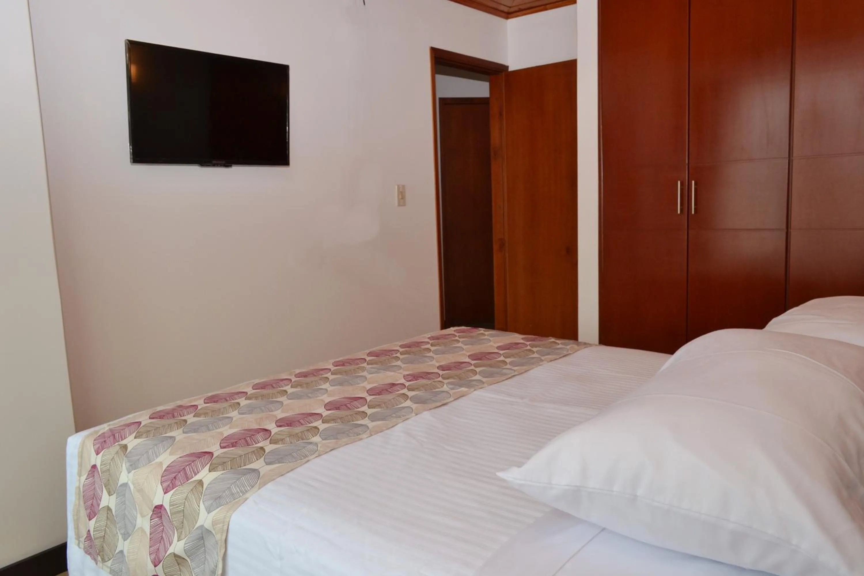 Bed in Apartahotel Doble3