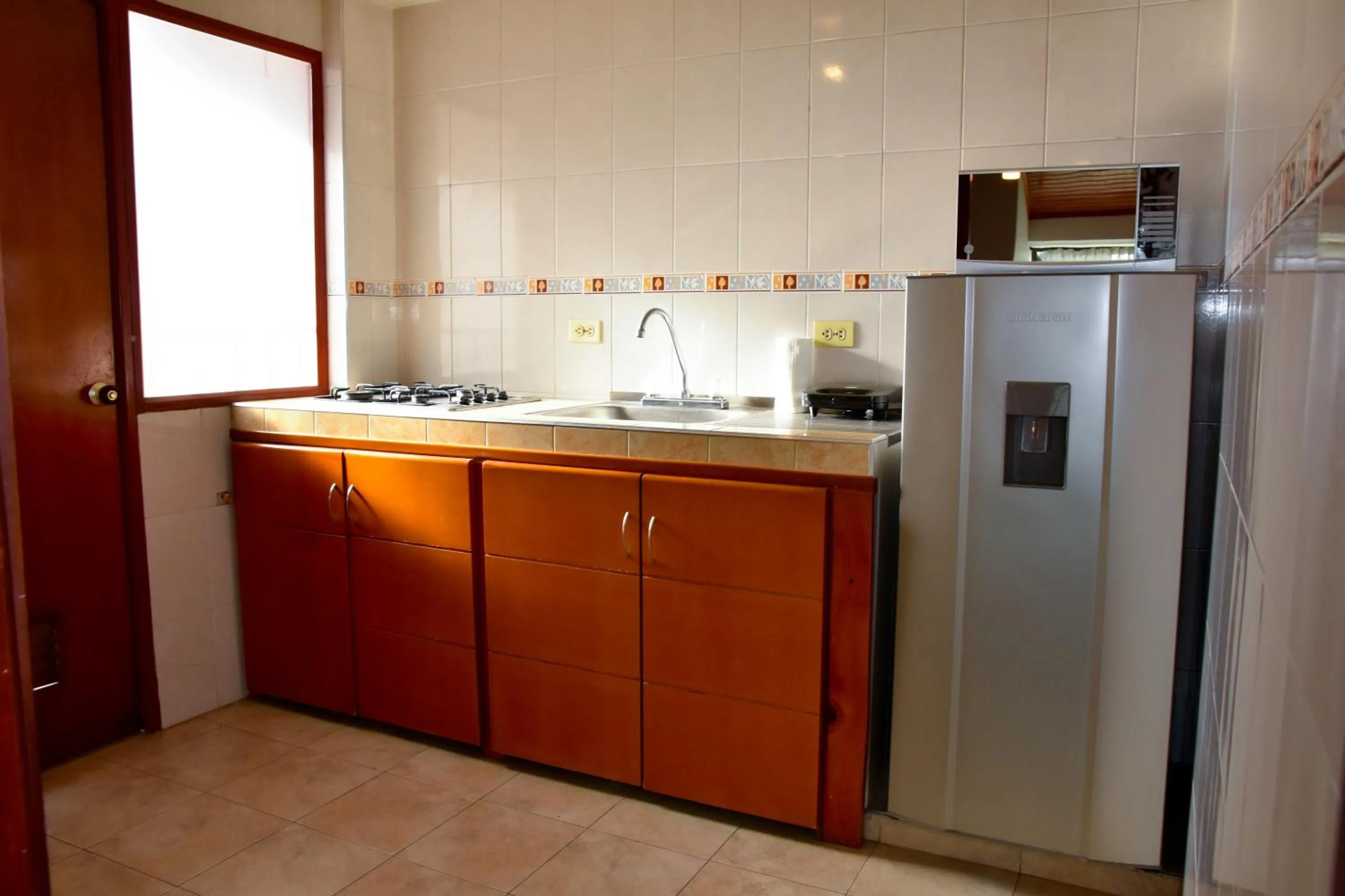Kitchen or kitchenette in Apartahotel Doble3