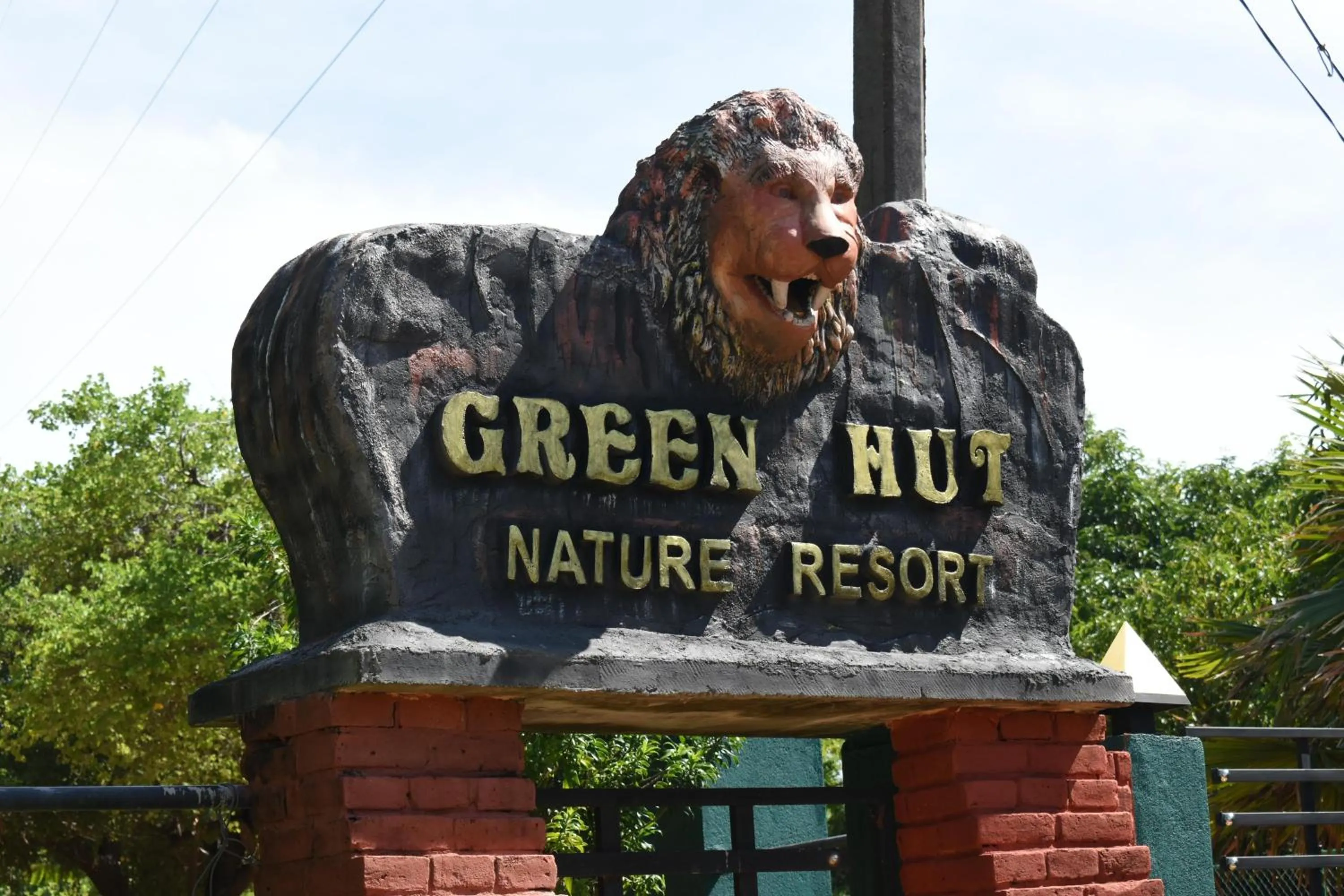 Property logo or sign in Green Hut Nature Resort