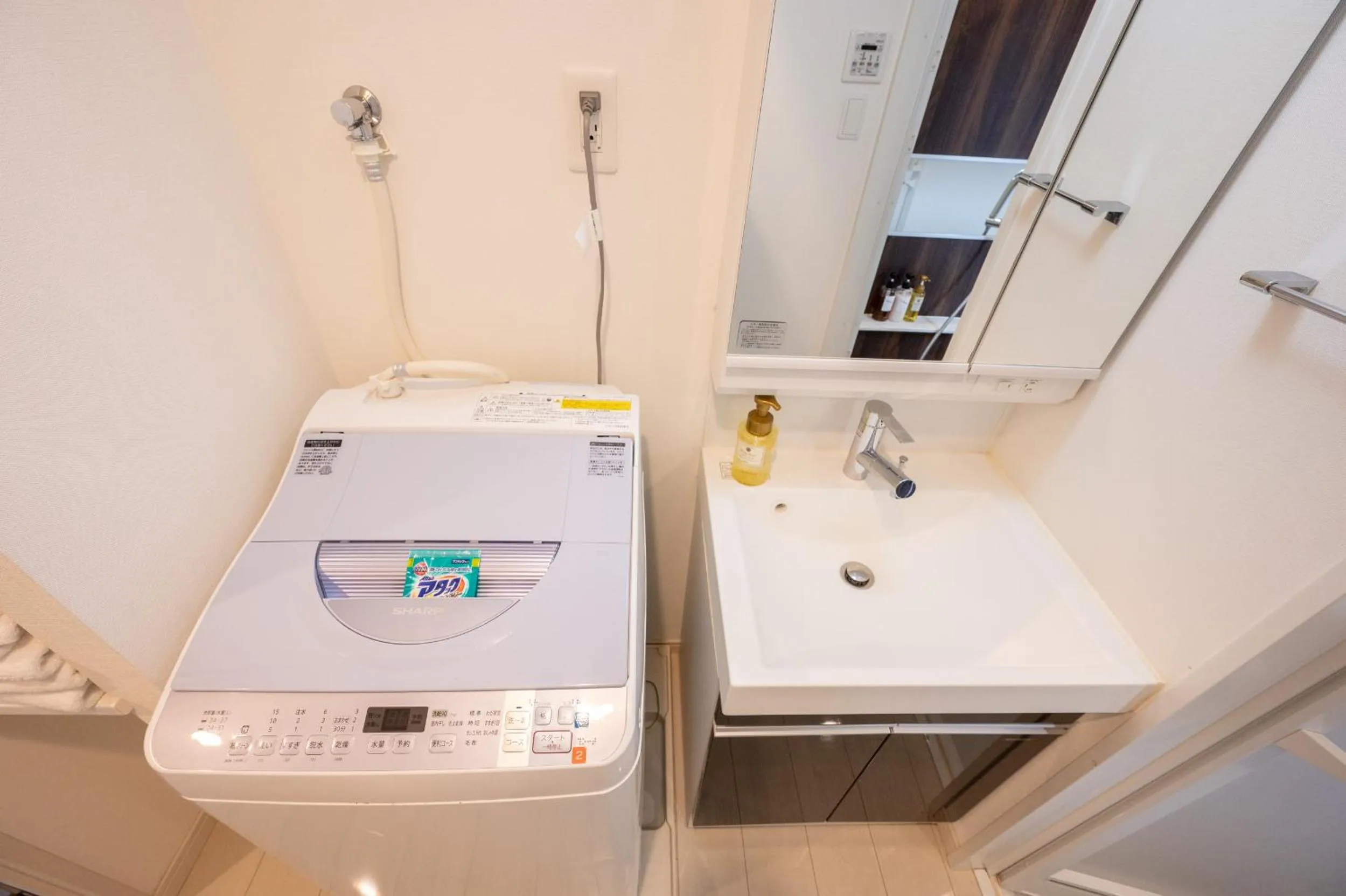 washing machine in Residence Hotel Hakata 8