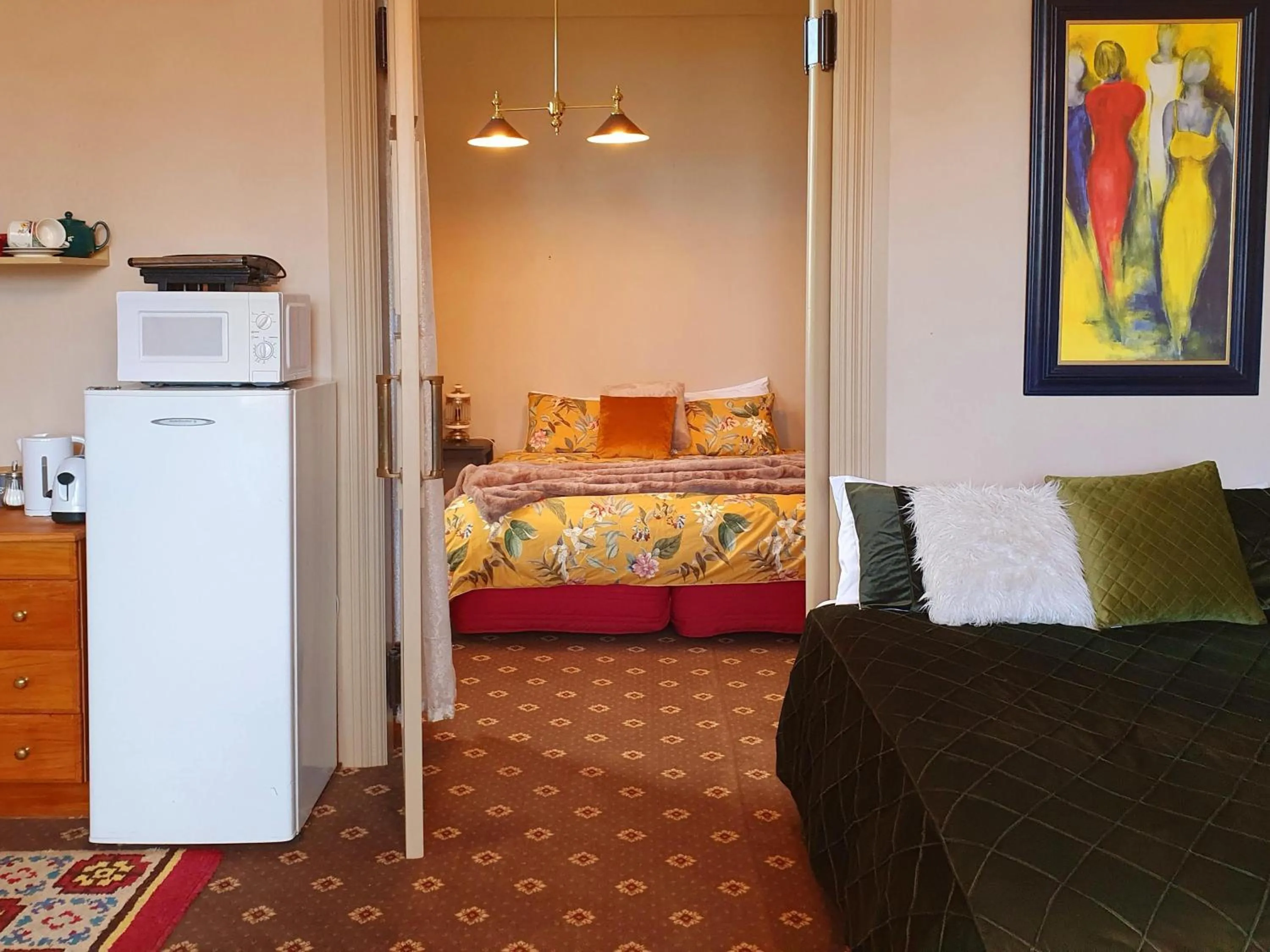 Bedroom in La Riviera Guesthouse