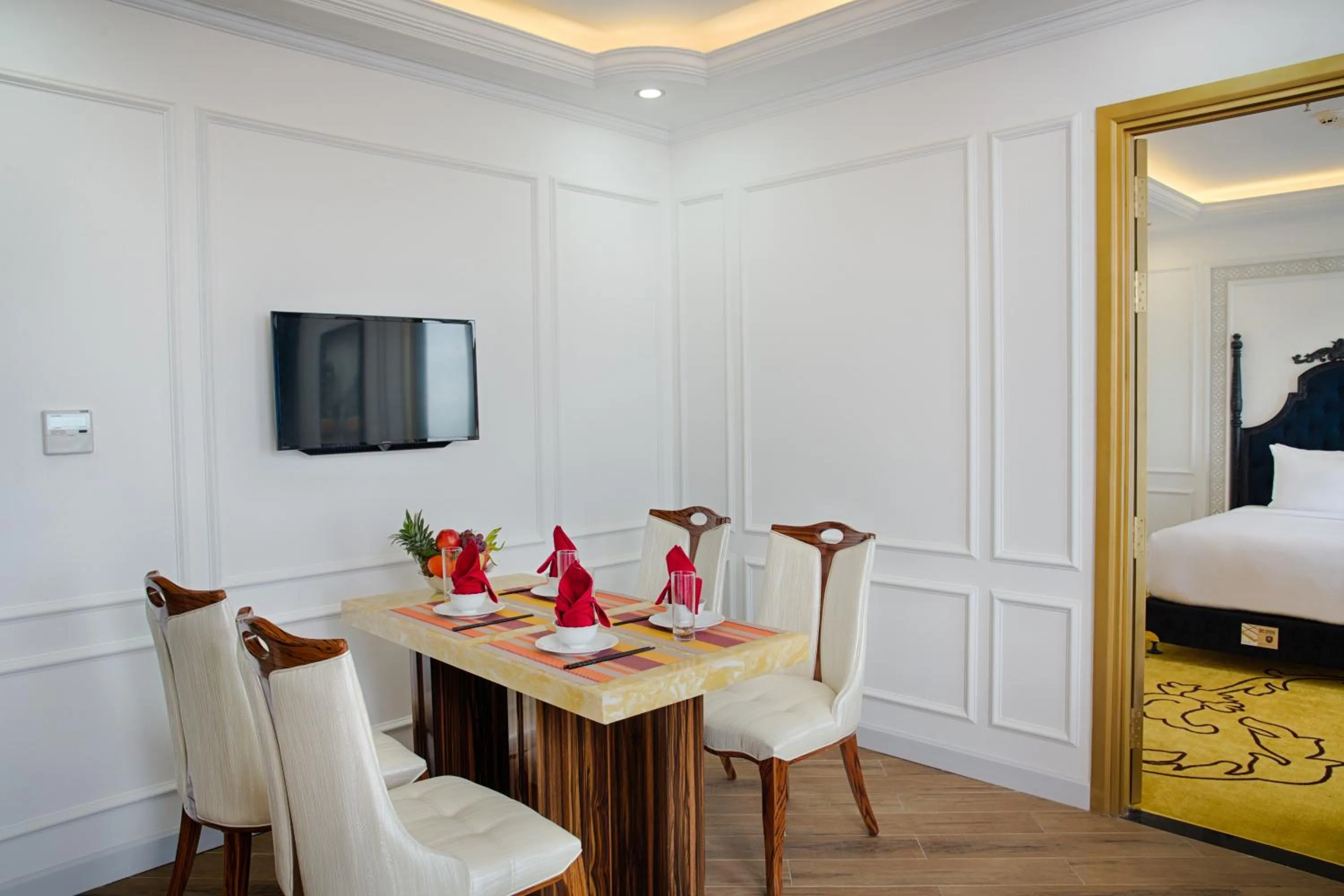 Dining area, Bed in Fivitel Da Nang