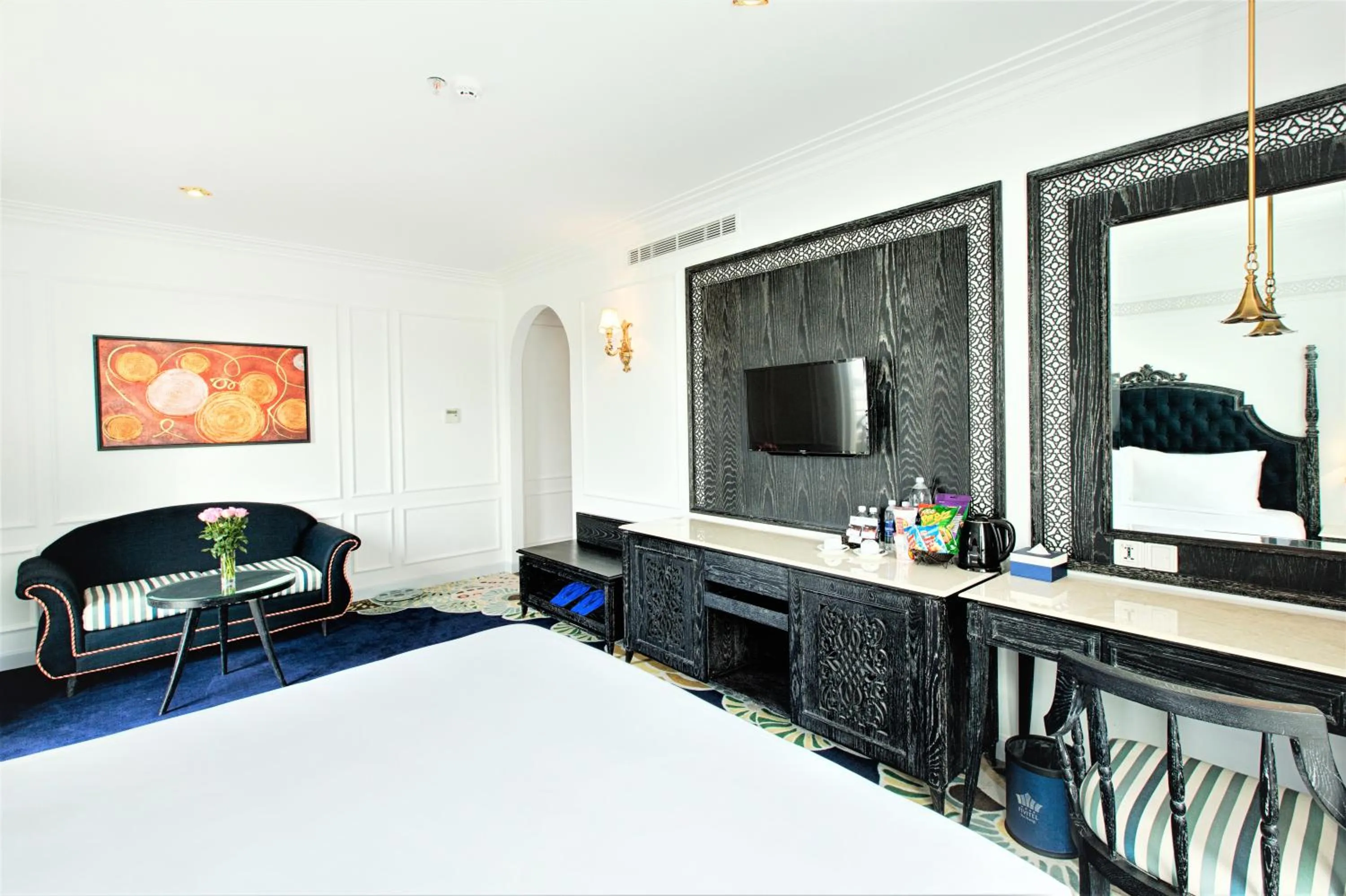 Communal lounge/ TV room, Bed in Fivitel Da Nang