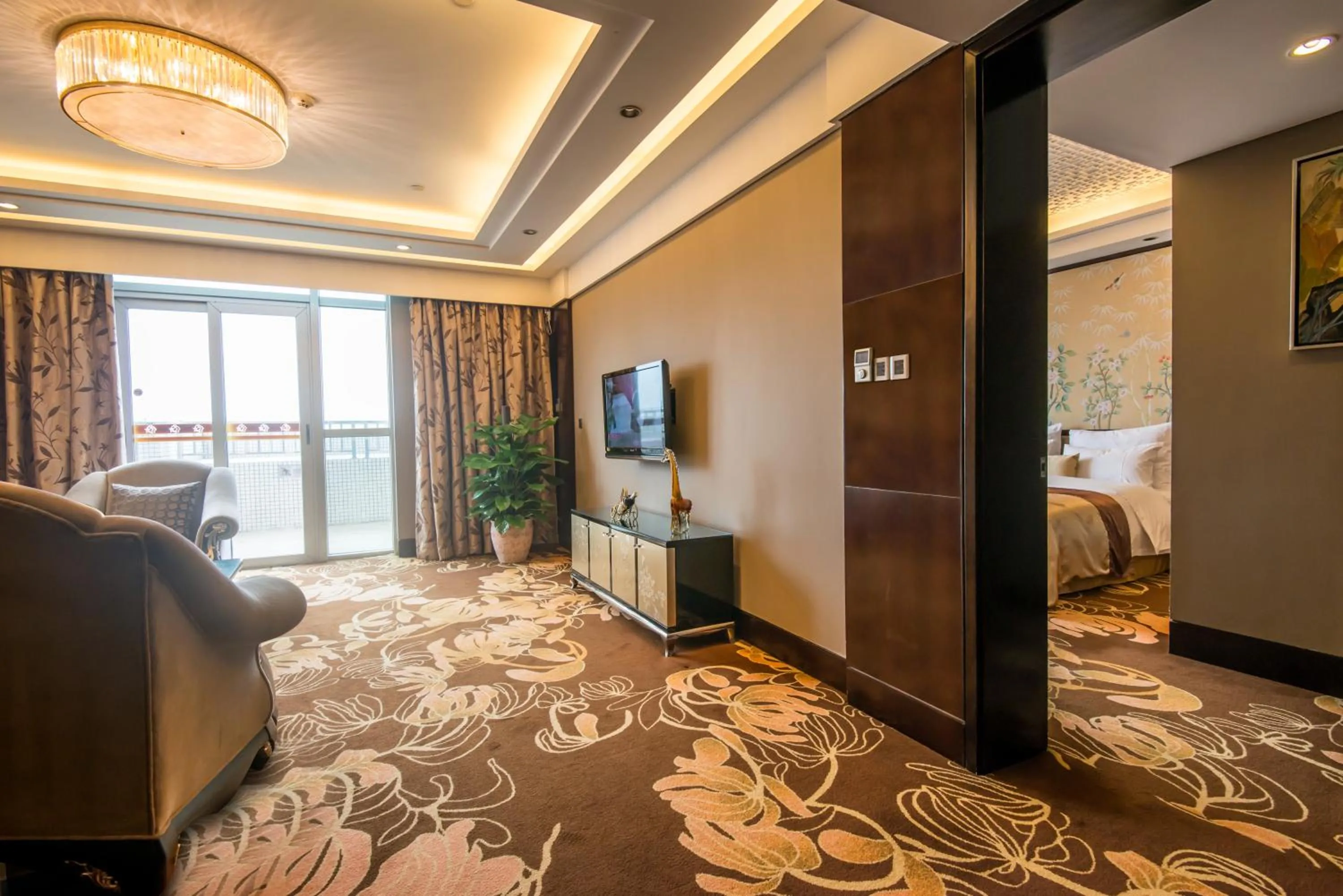 Living room, Bed in Panyu Hotel