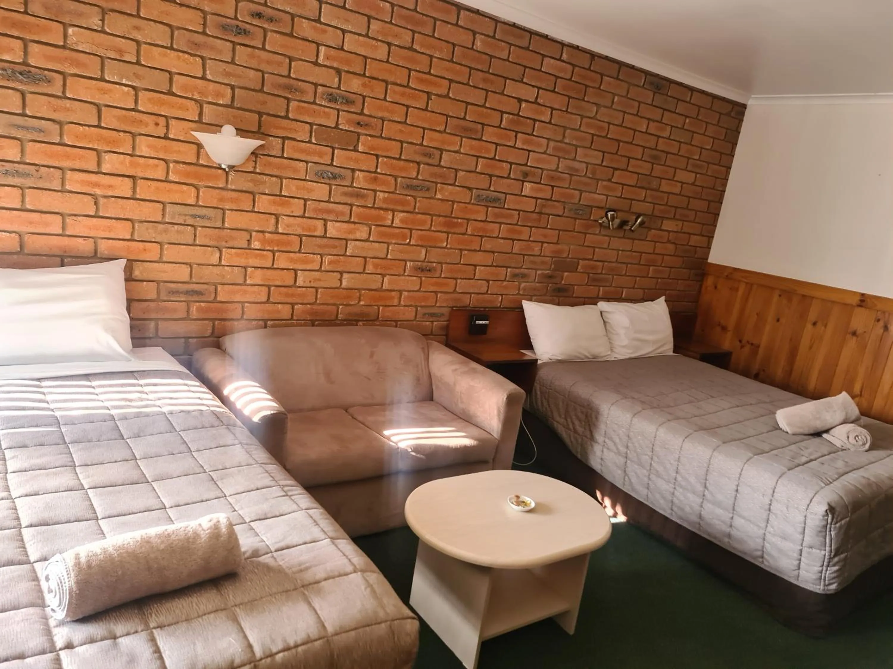 Bed in Regency Court Motel