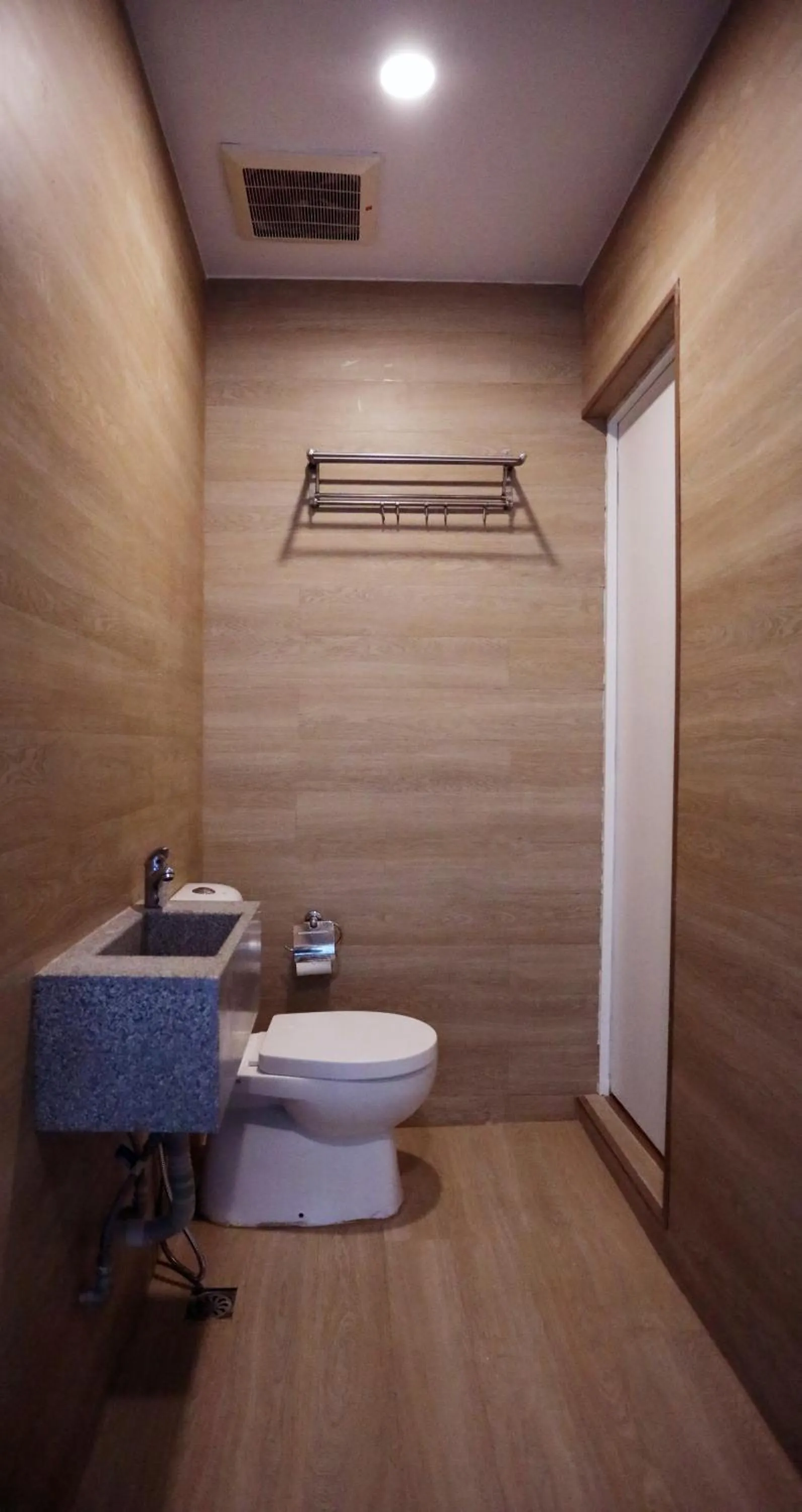 Toilet in Vivids Hotel