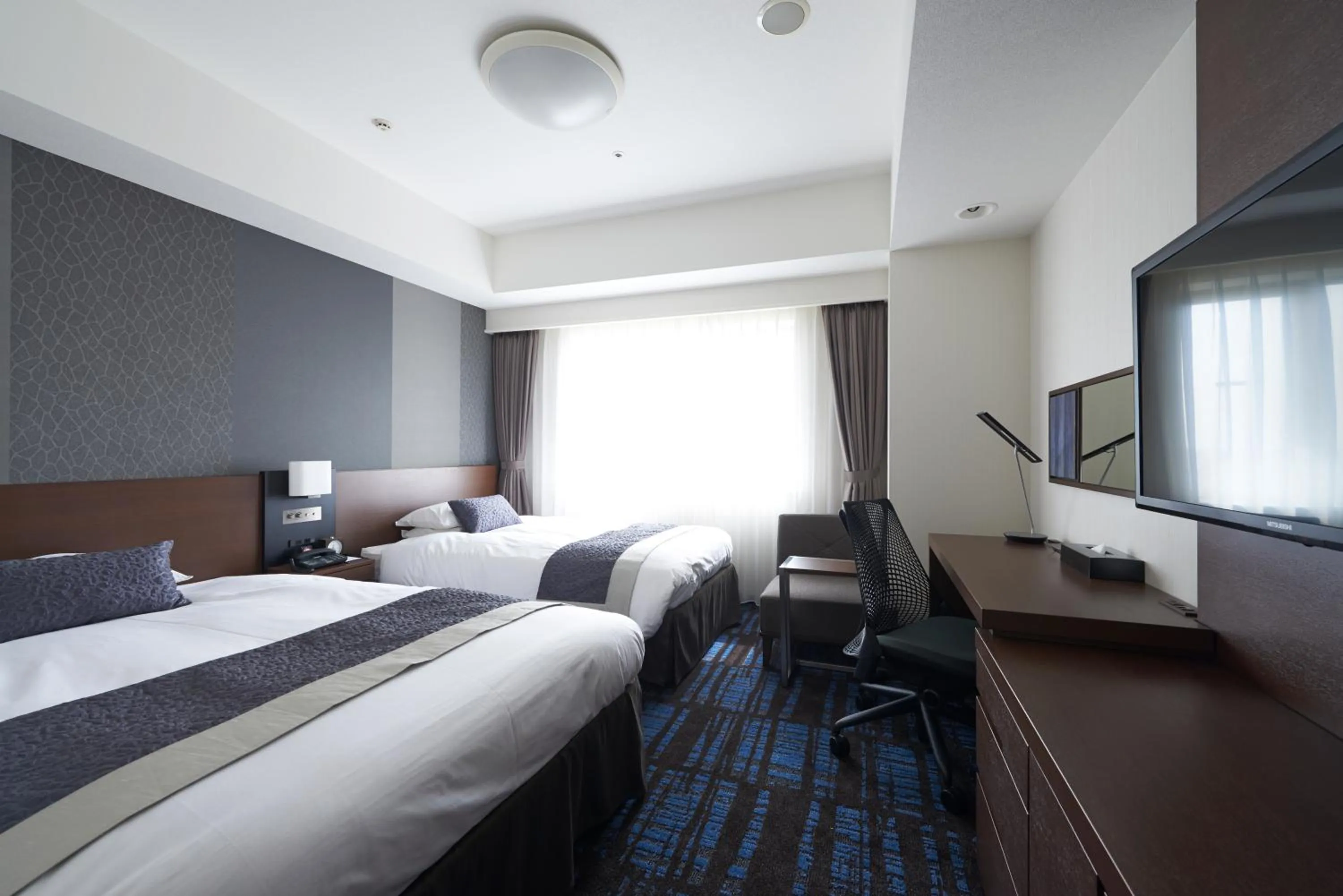 Photo of the whole room, Bed in HOTEL VISCHIO AMAGASAKI by GRANVIA