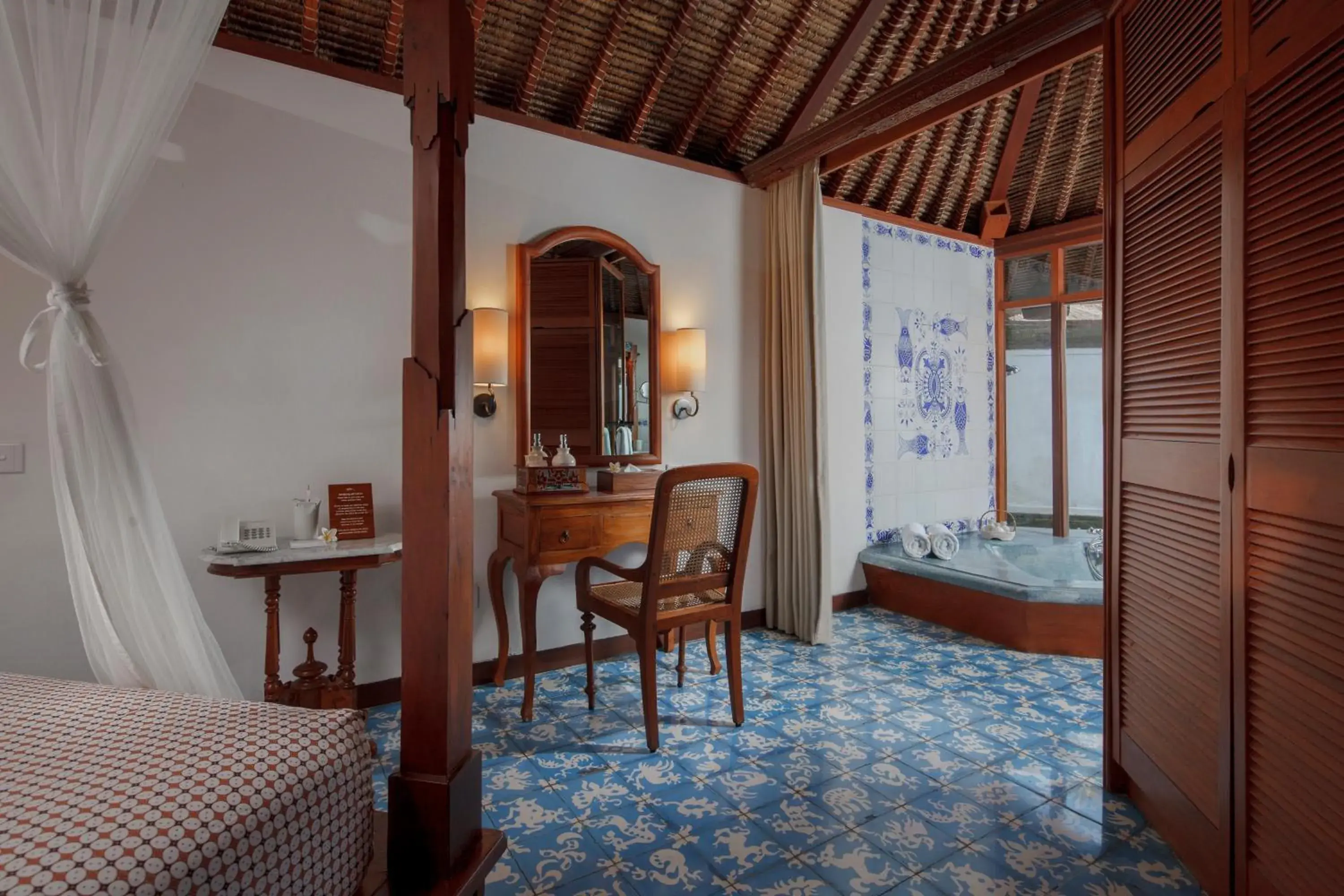 Living room, Bed in Tandjung Sari Hotel Living room, Bed in Tandjung Sari Hotel