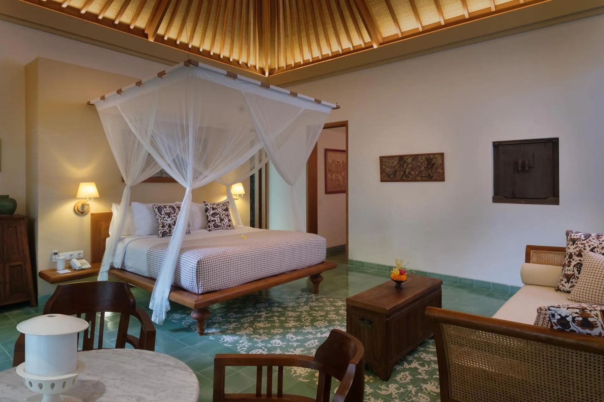 Seating area, Bed in Tandjung Sari Hotel