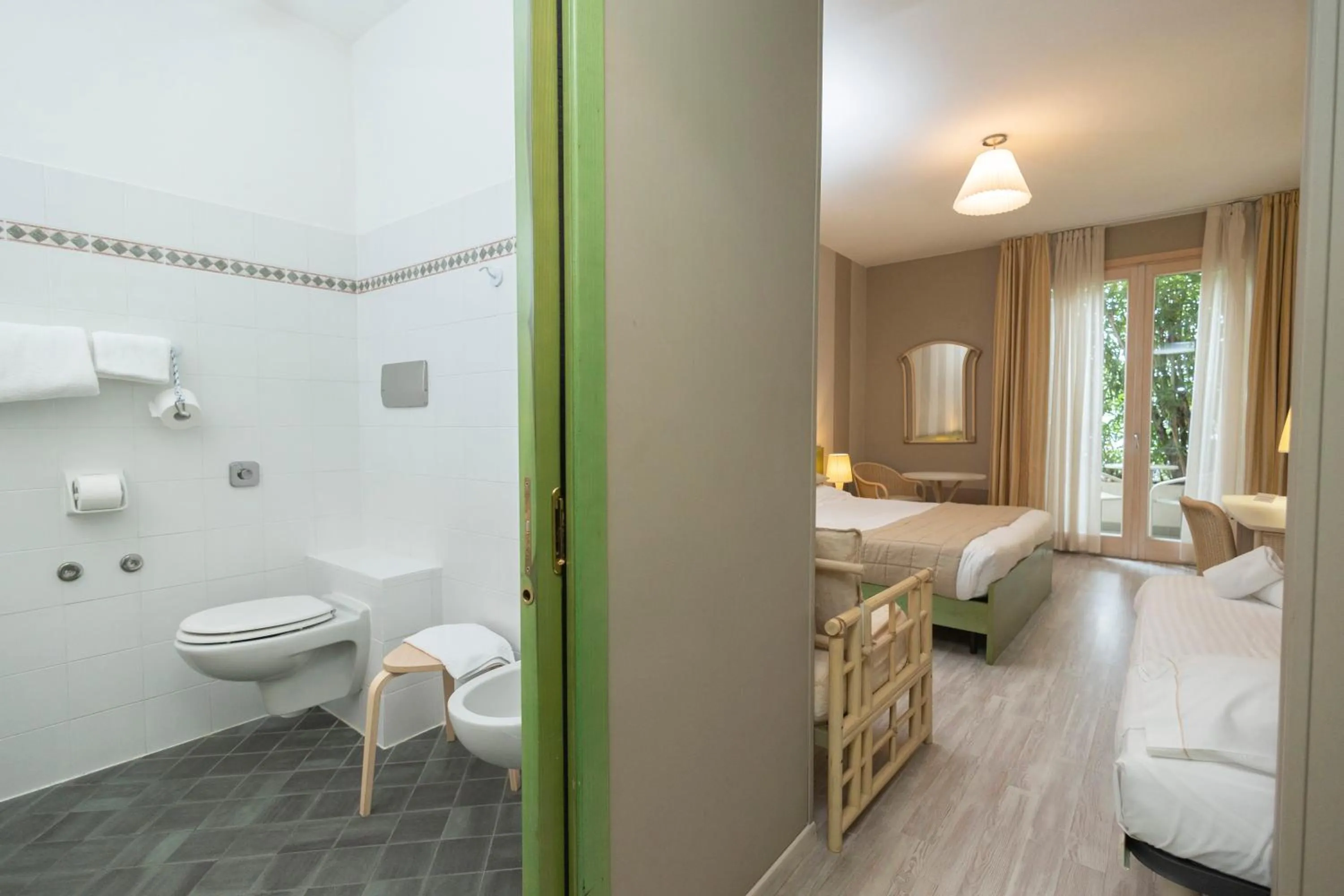 Toilet, Bed in Hotel Berta