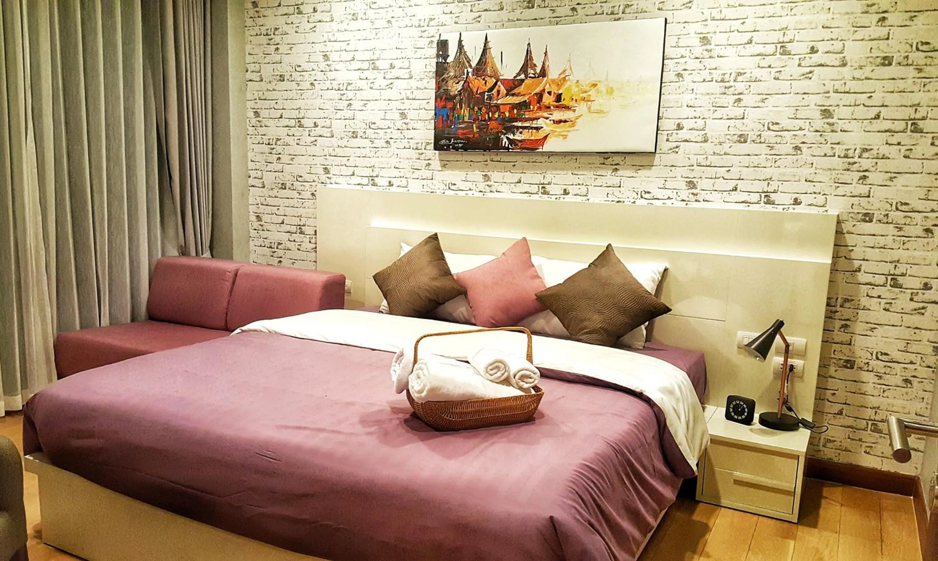 Bed in Astra Suites Night Bazaar