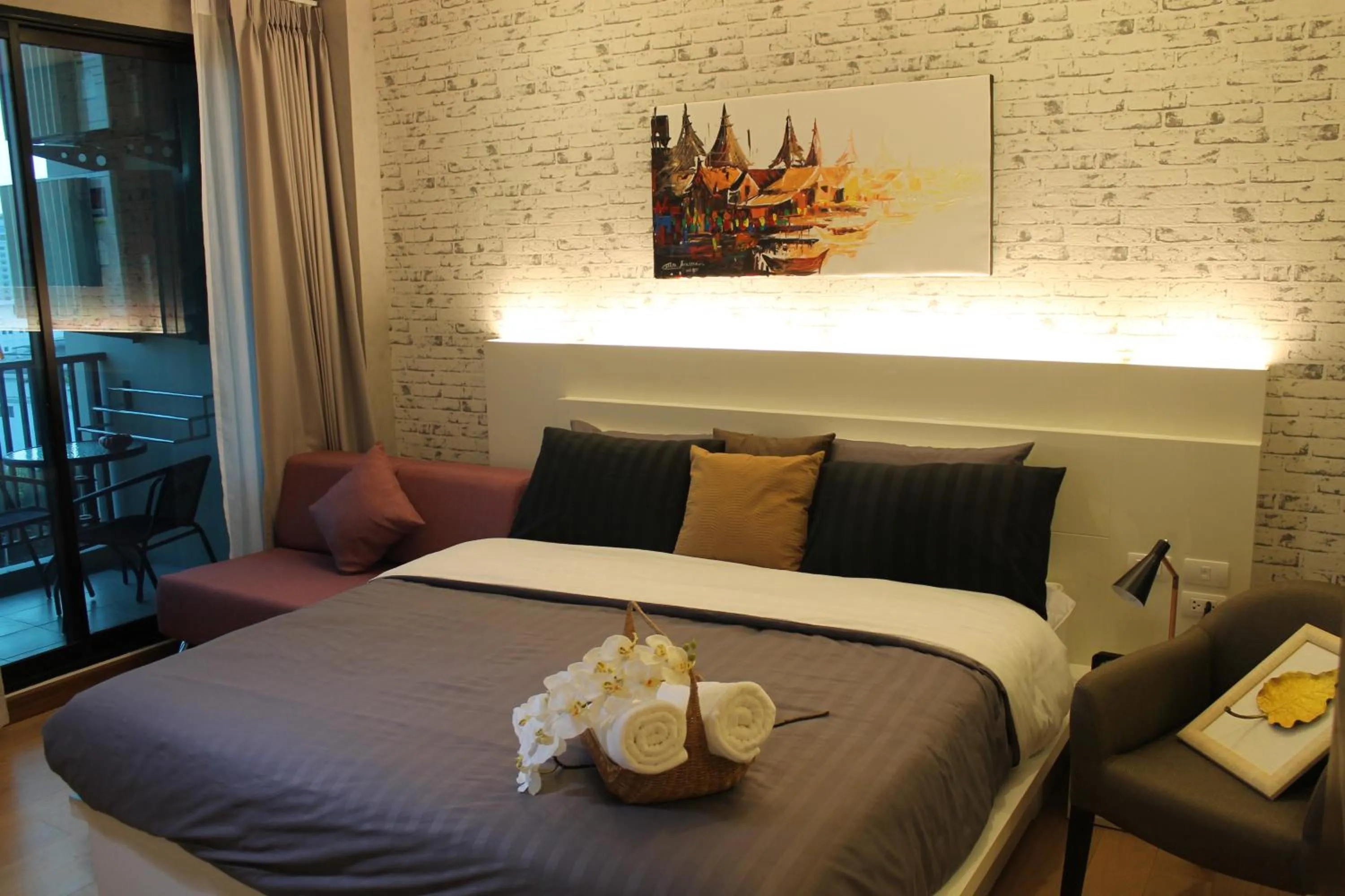 Bed in Astra Suites Night Bazaar