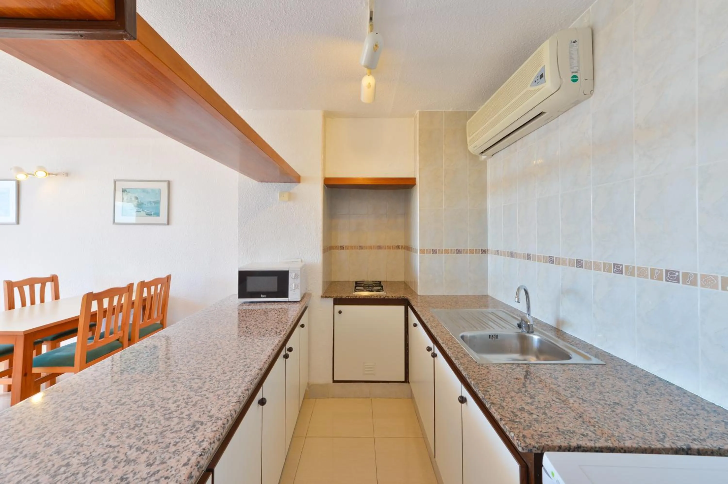 Kitchen or kitchenette in Apartamentos Lido