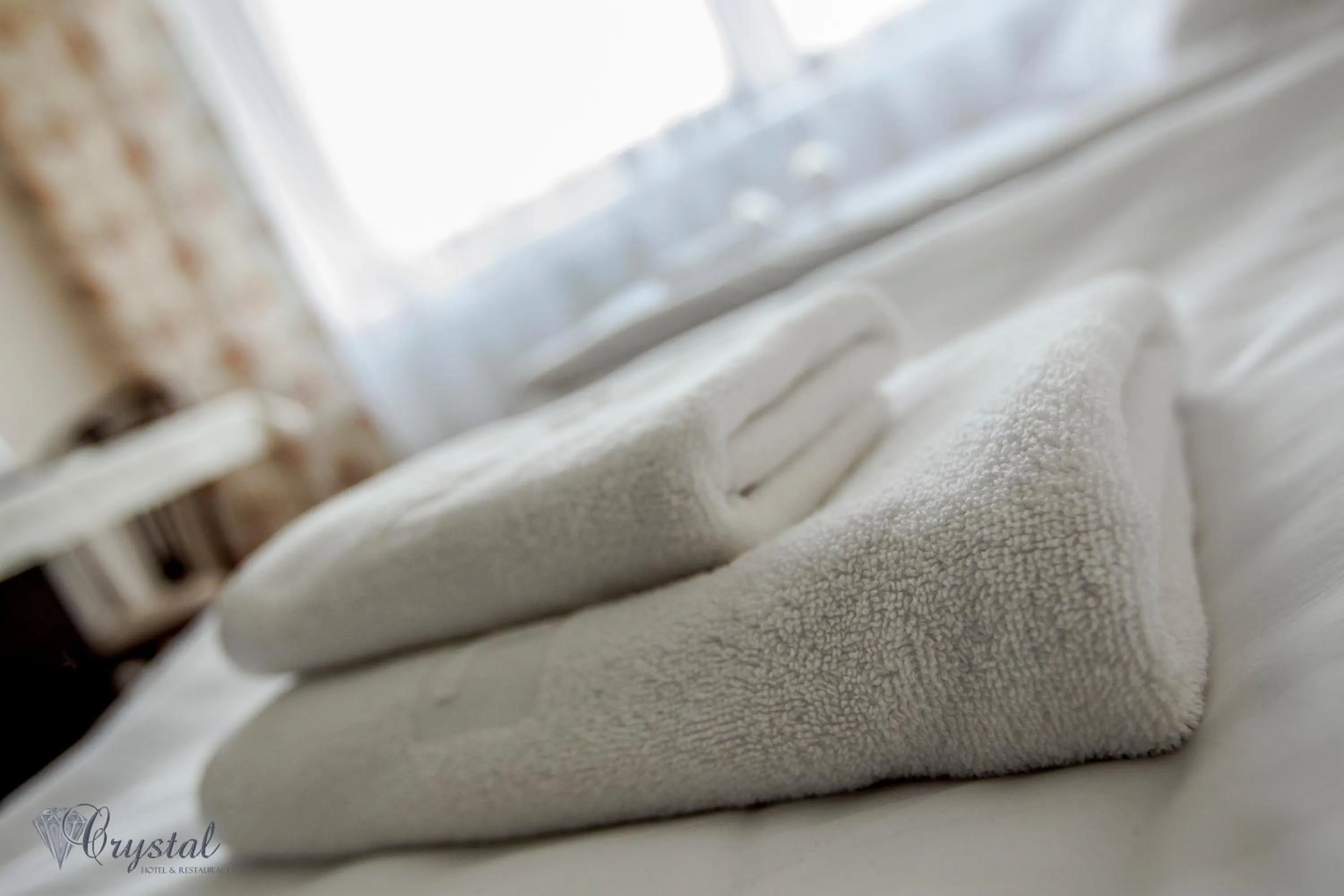 Bed in Hotel Crystal