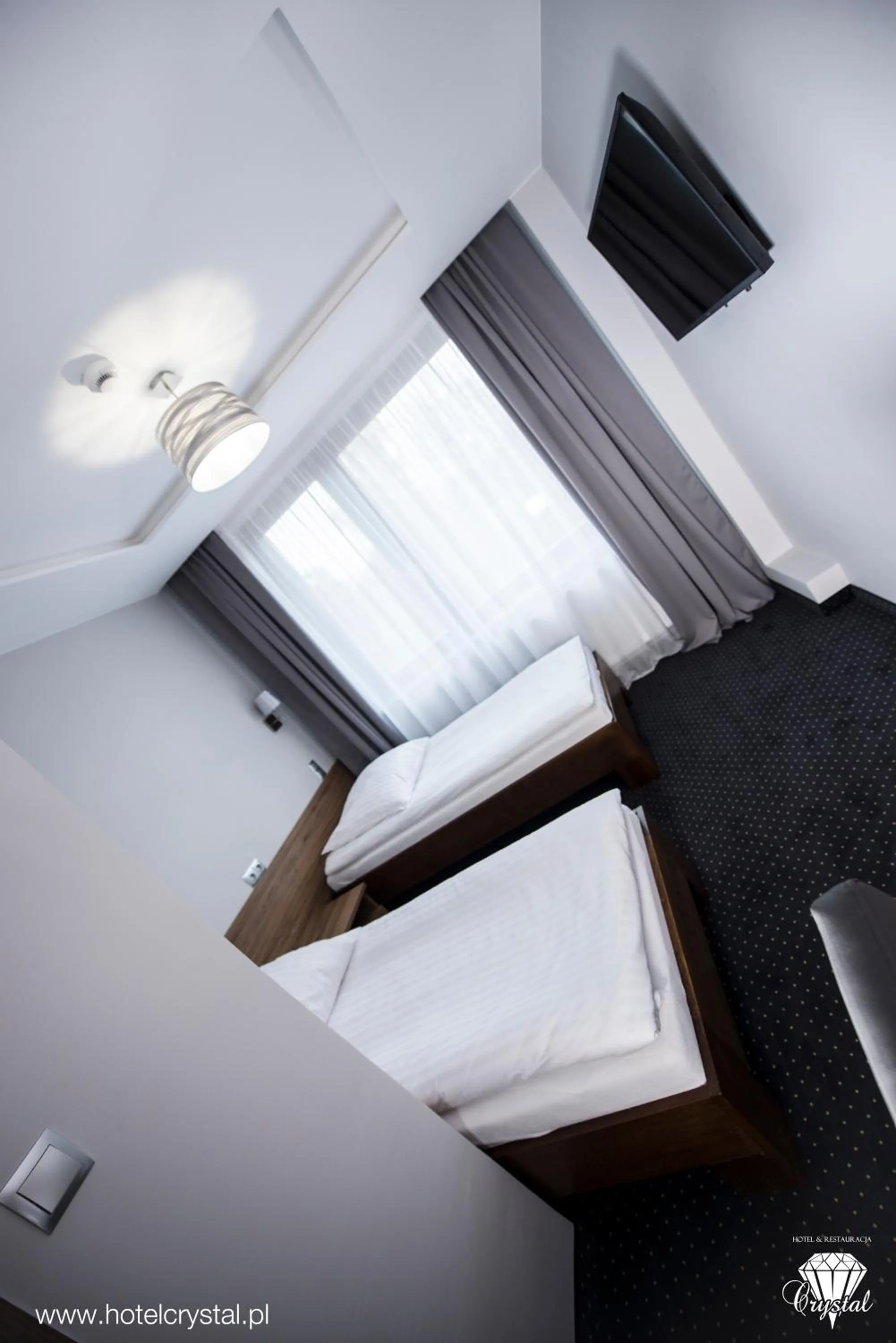 Bed in Hotel Crystal