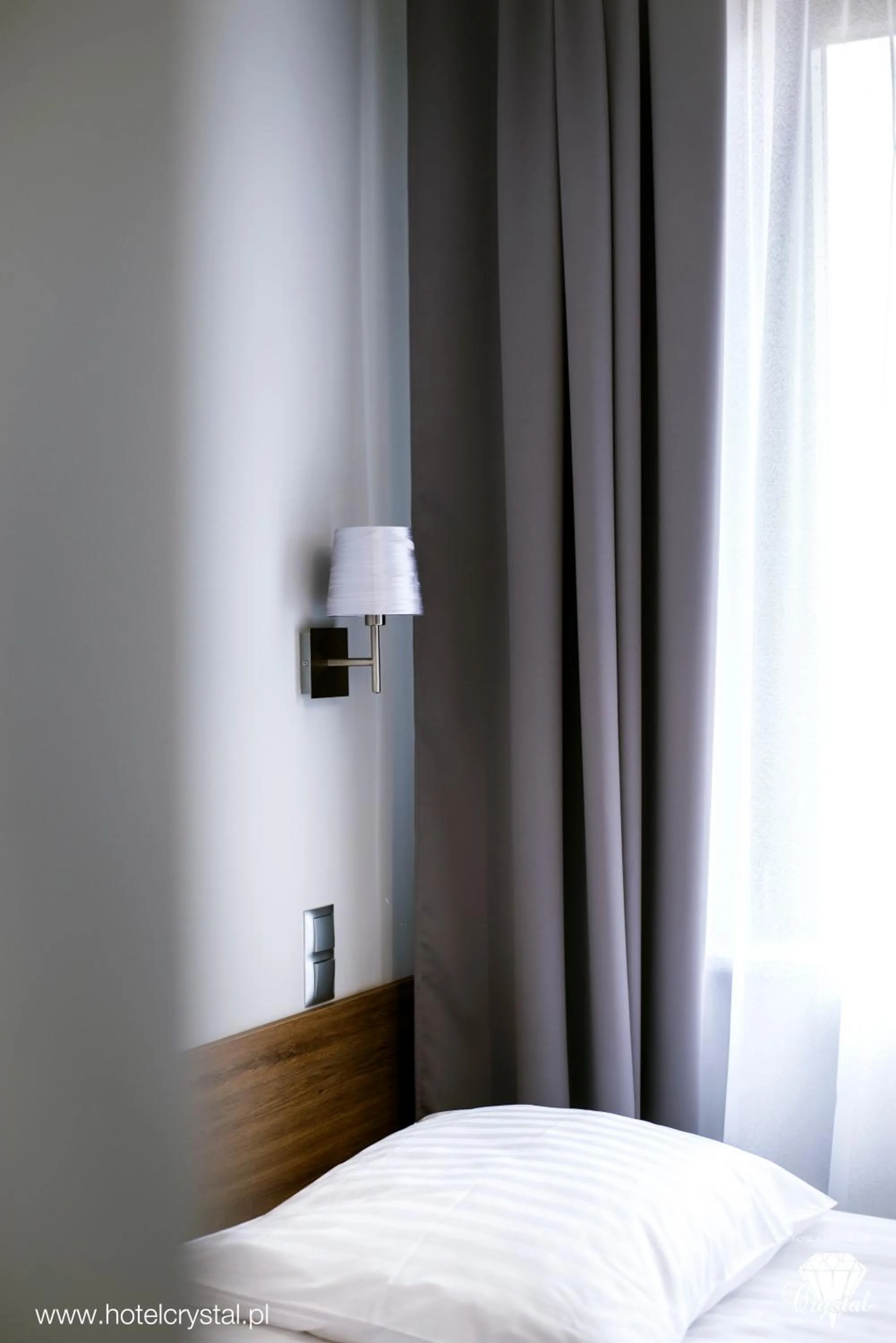 Bed in Hotel Crystal