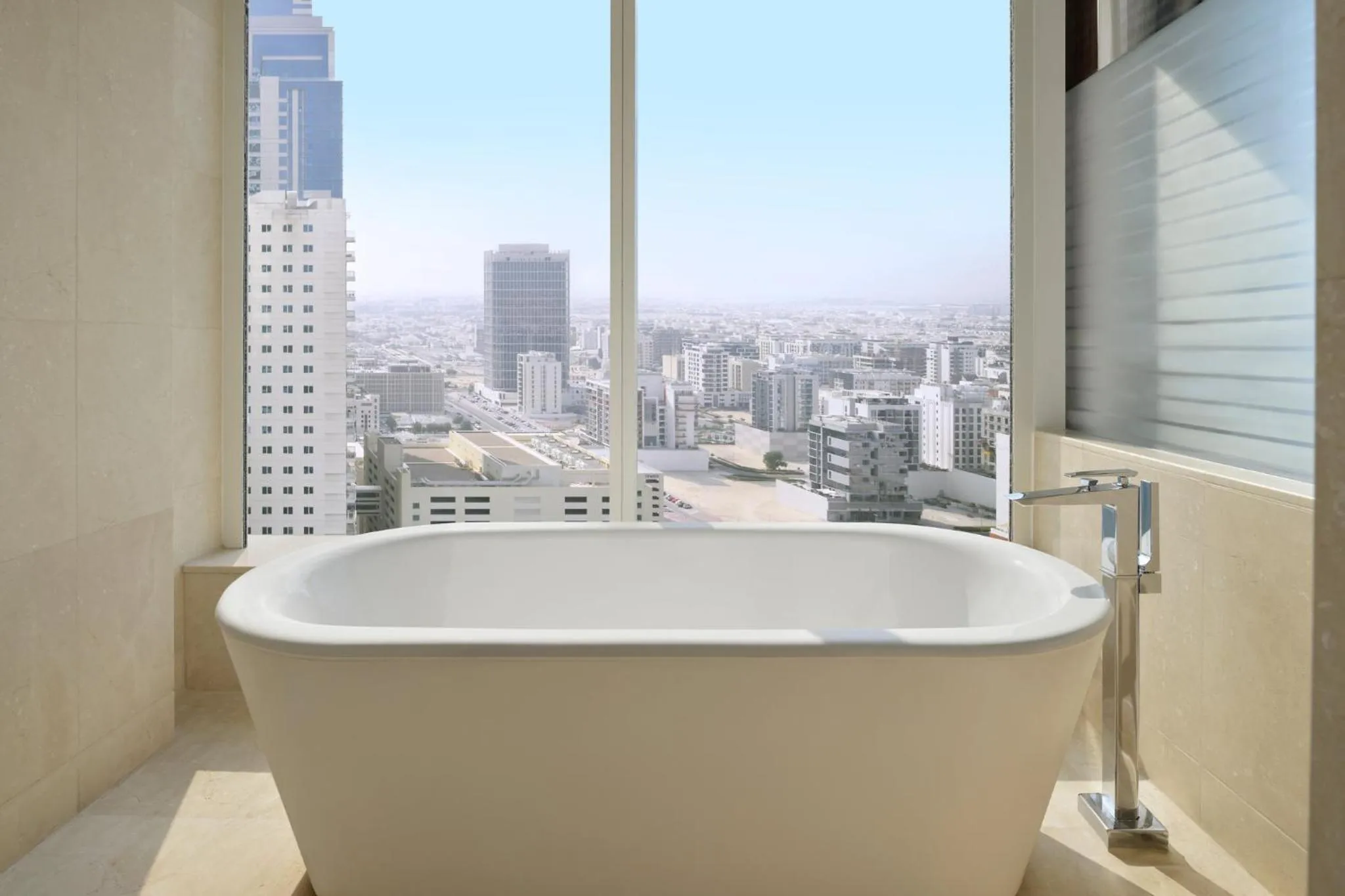 Bathroom in voco Dubai by IHG