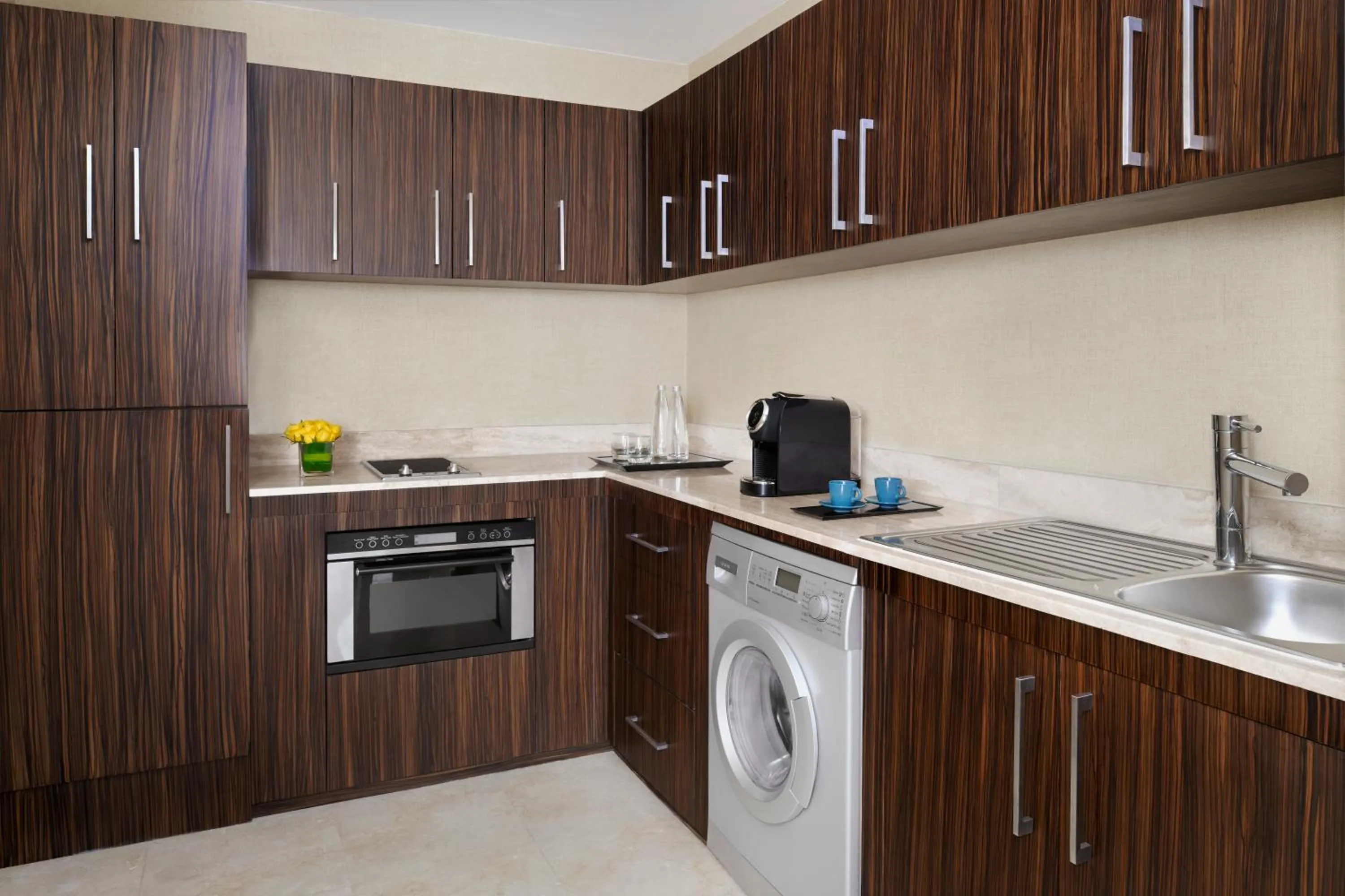 Kitchen or kitchenette in voco Dubai by IHG