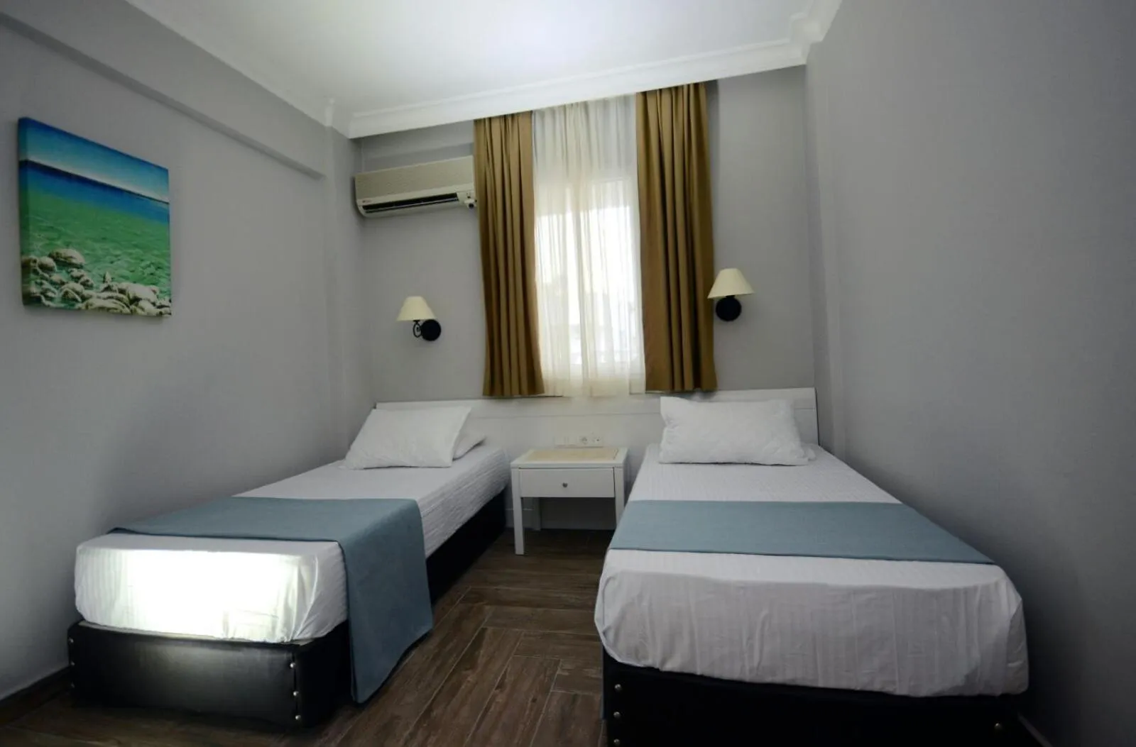 Bed in Two Seas Hotel