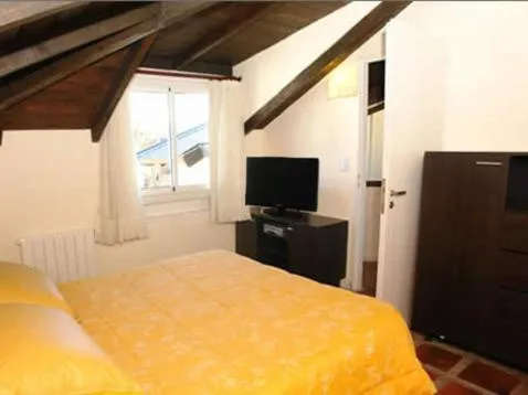 Photo of the whole room, Bed in Carilo Quimey