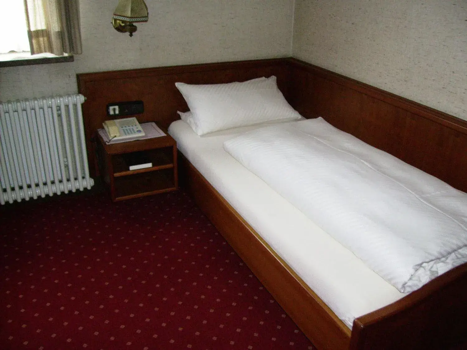 Bed in Hotel Lamm Bed in Hotel Lamm