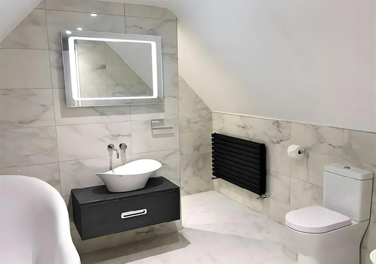 Bathroom in Santo's Higham Farm Hotel