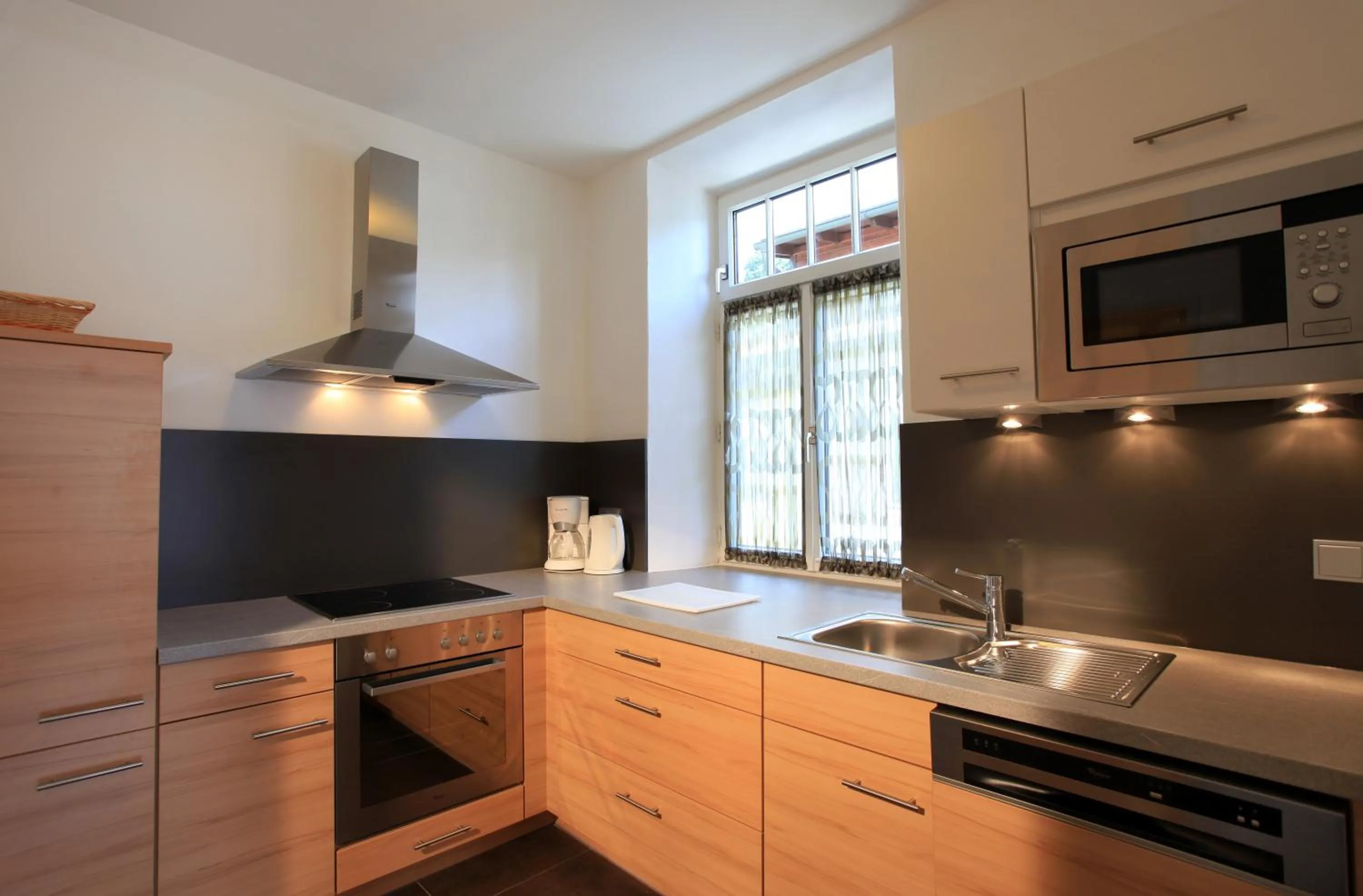 Kitchen or kitchenette in Romantik Residenz (Ferienwohnungen Hotel Im Weissen Rössl) - Dependance