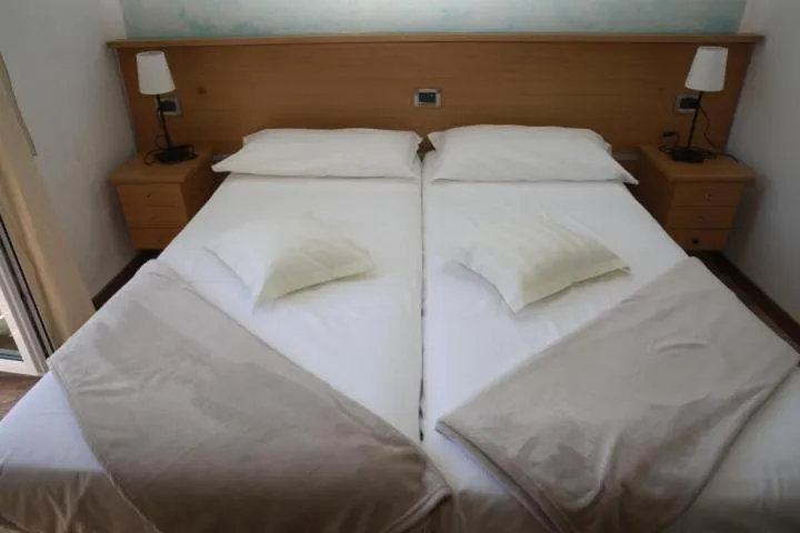Bed in Hotel Lauro