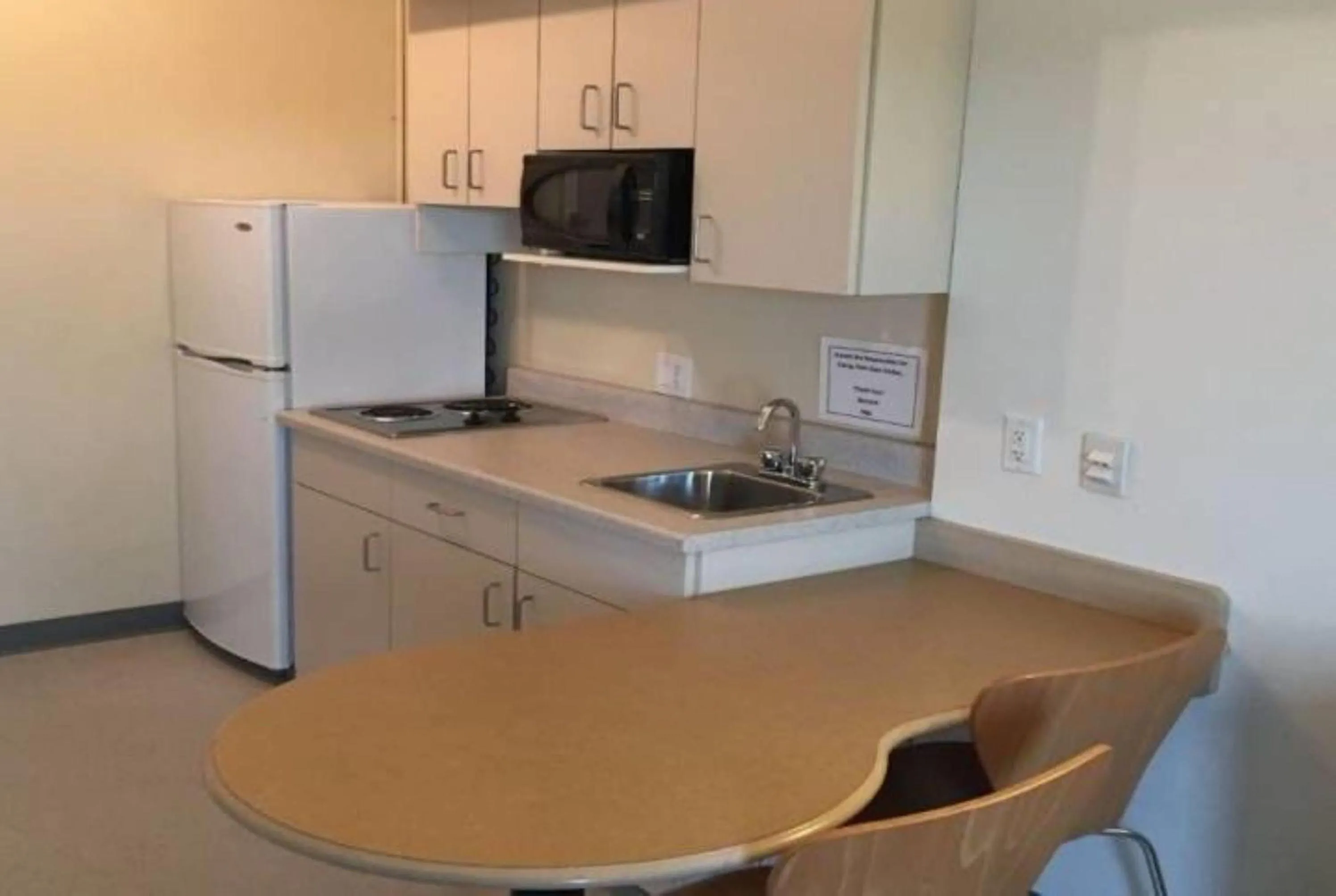 Kitchen or kitchenette in Super 8 by Wyndham Estevan