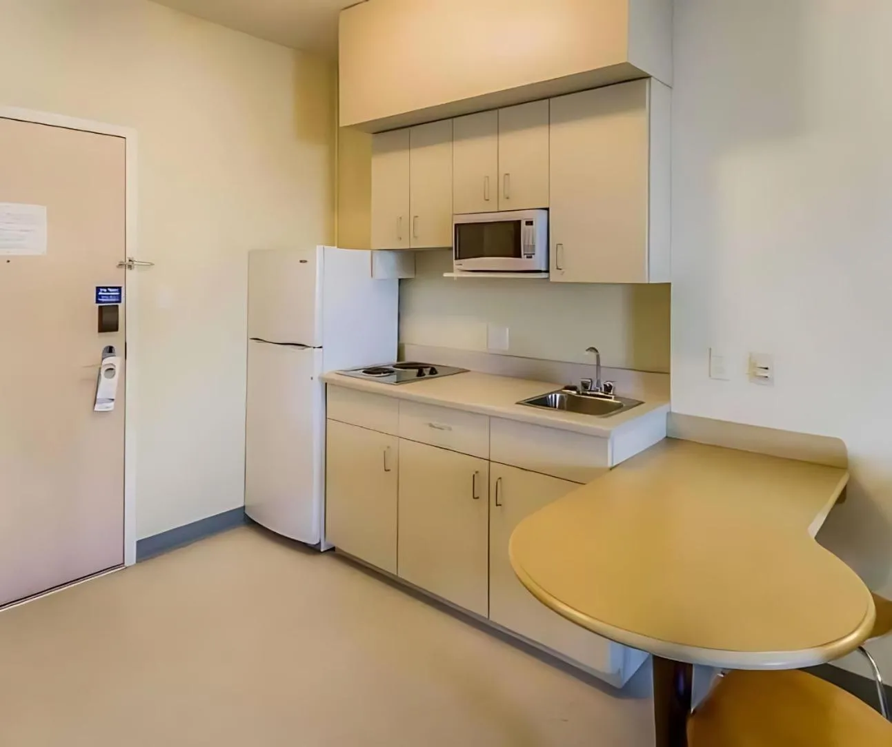 Kitchen or kitchenette in Super 8 by Wyndham Estevan